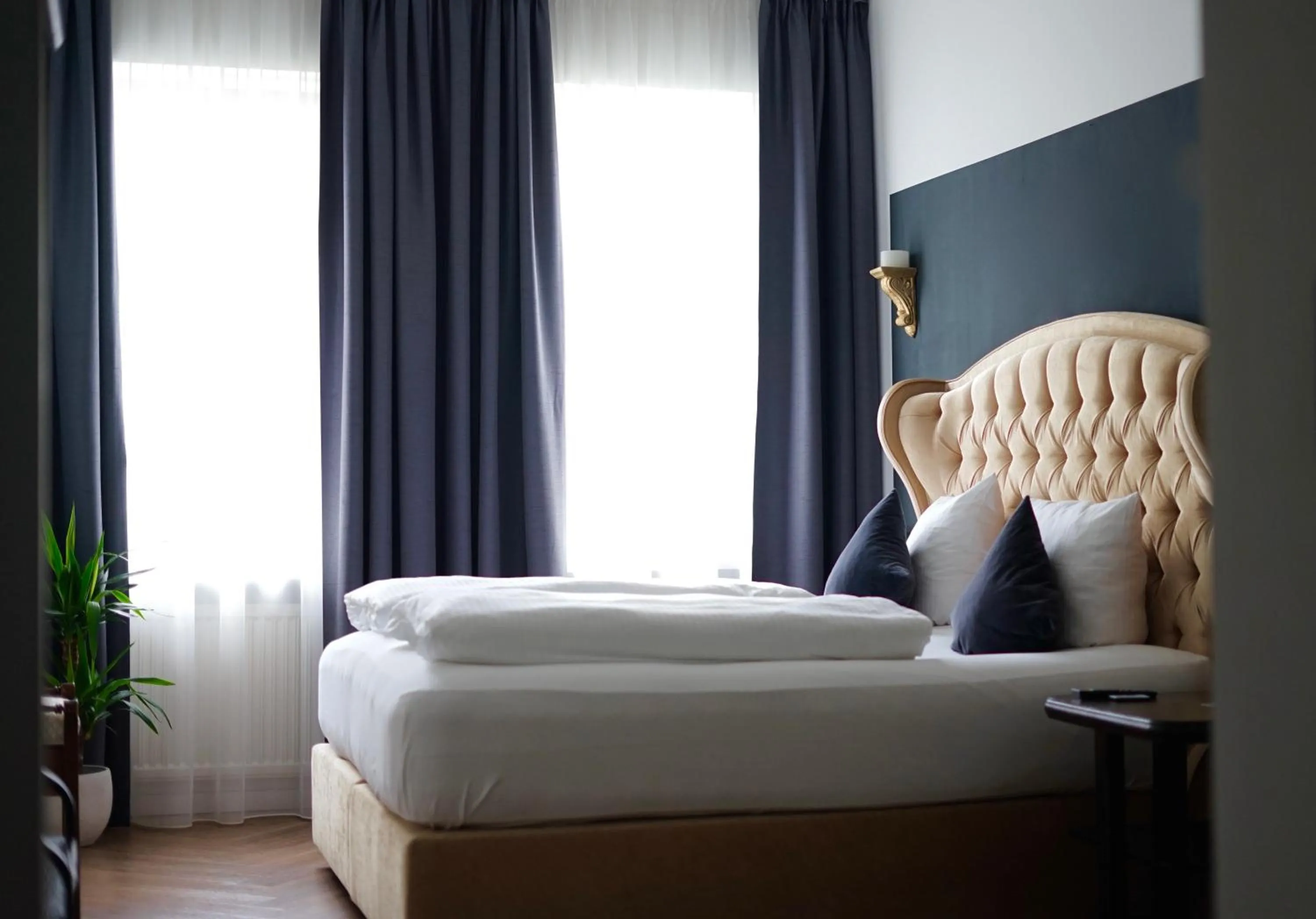Bed in Hotel Mühldorf