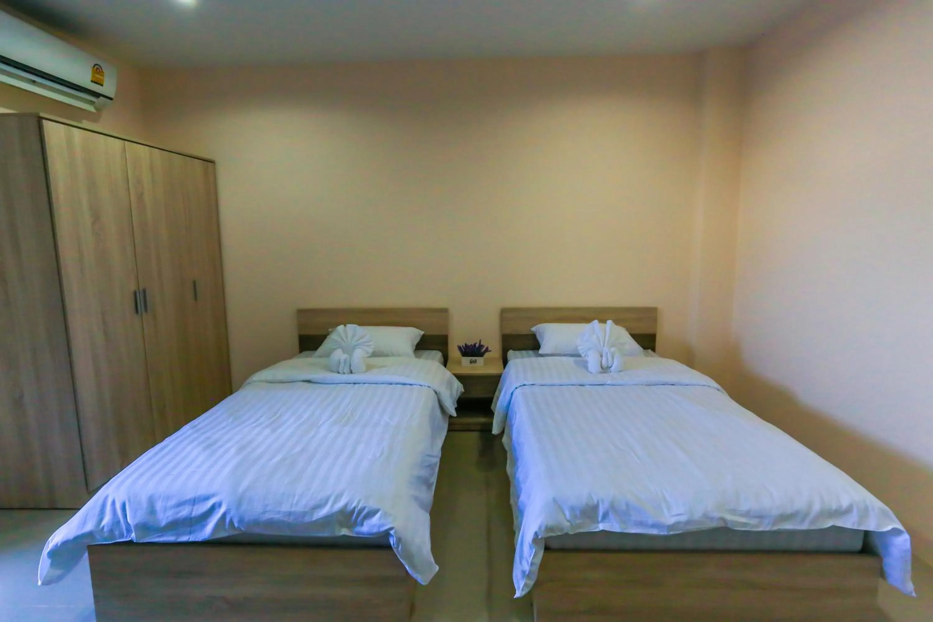 Bed in Tempo Plus Apartment