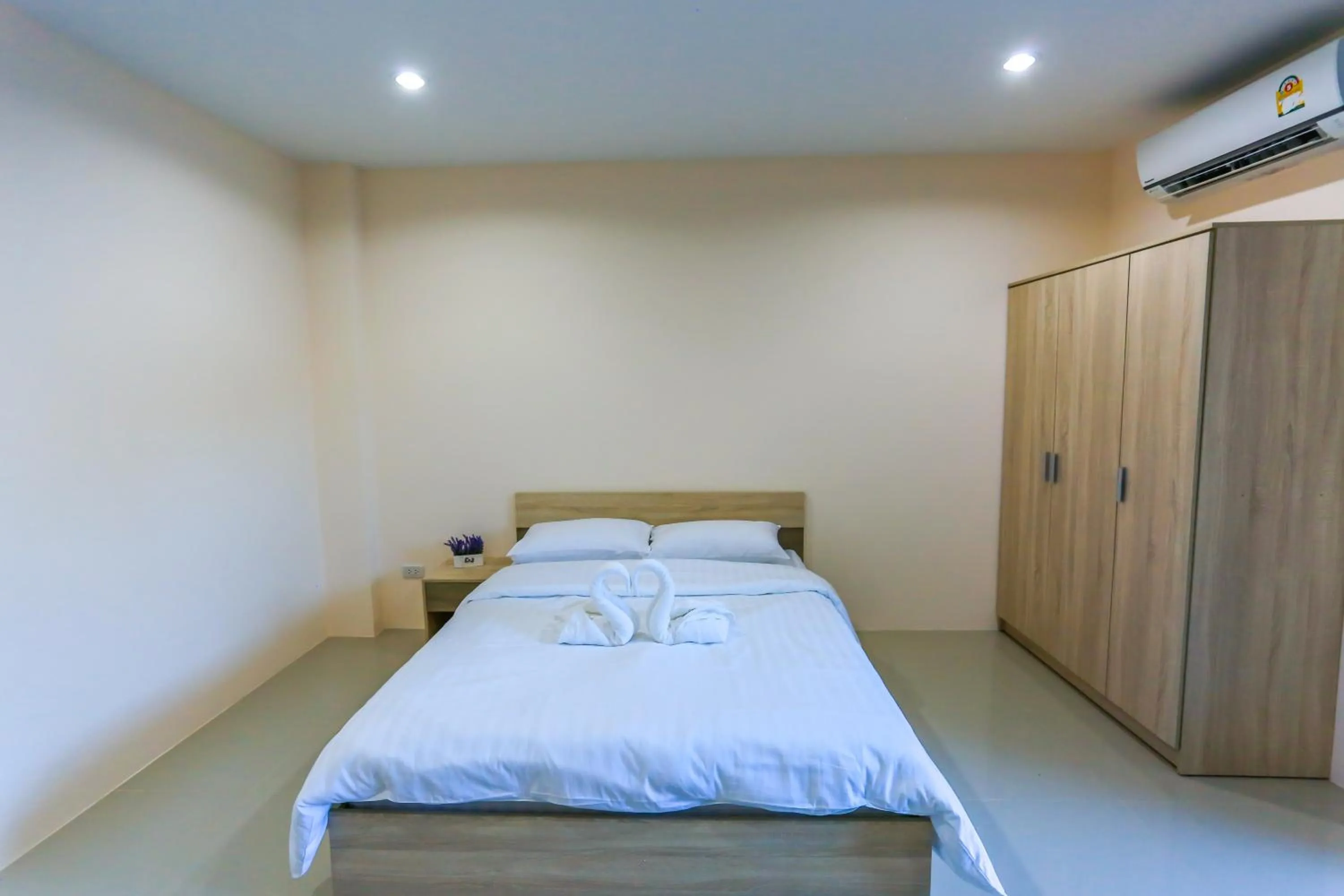 Bed in Tempo Plus Apartment