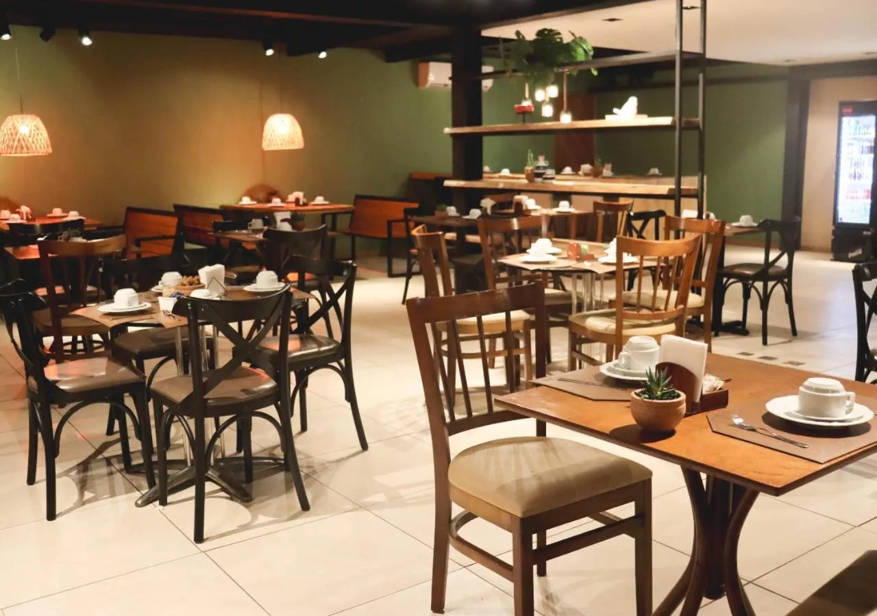 Communal lounge/ TV room in Grão Pará Petrópolis