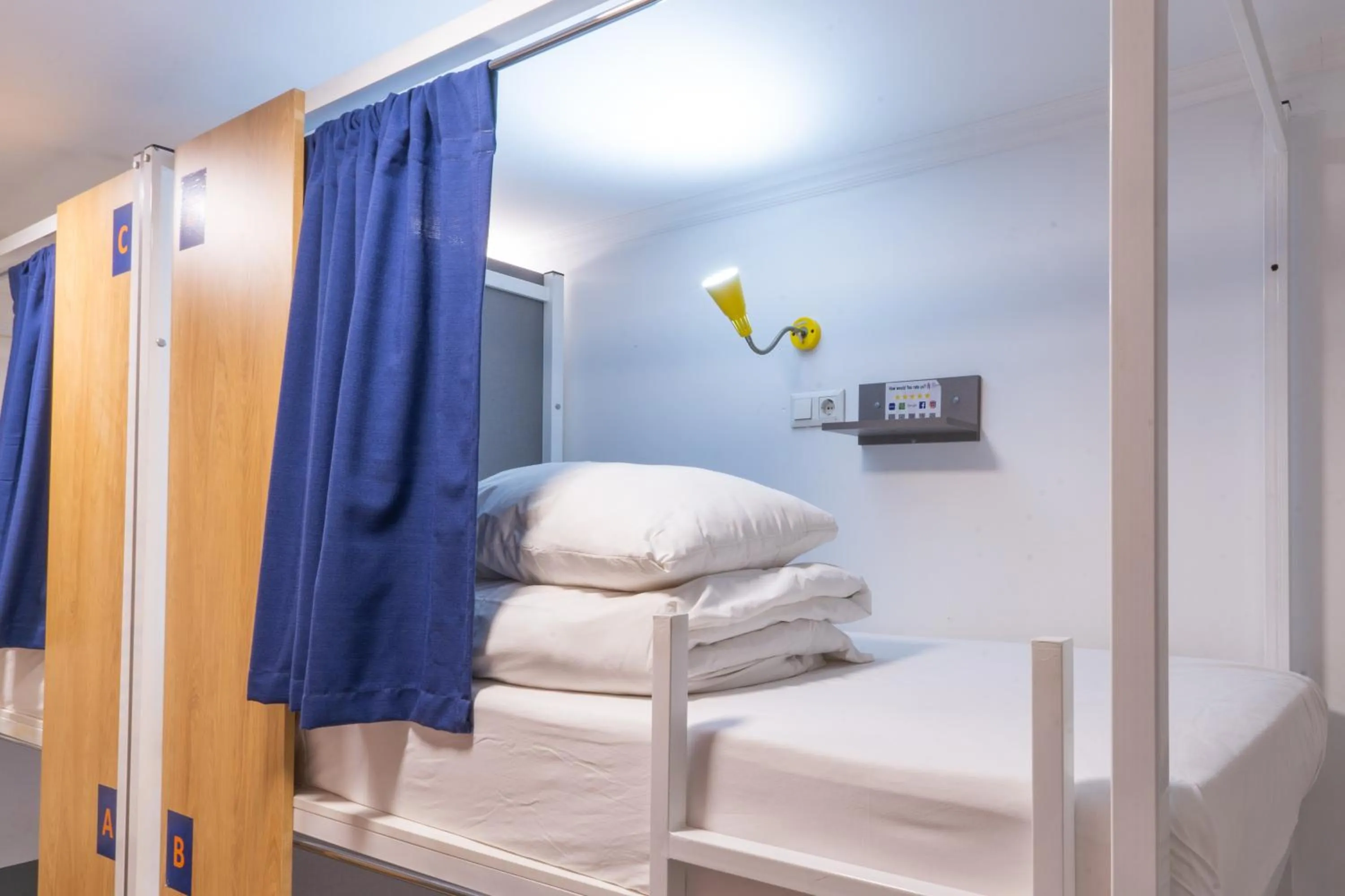 Kitchen or kitchenette, Bed in ololoFreelander Hostel&Coworking