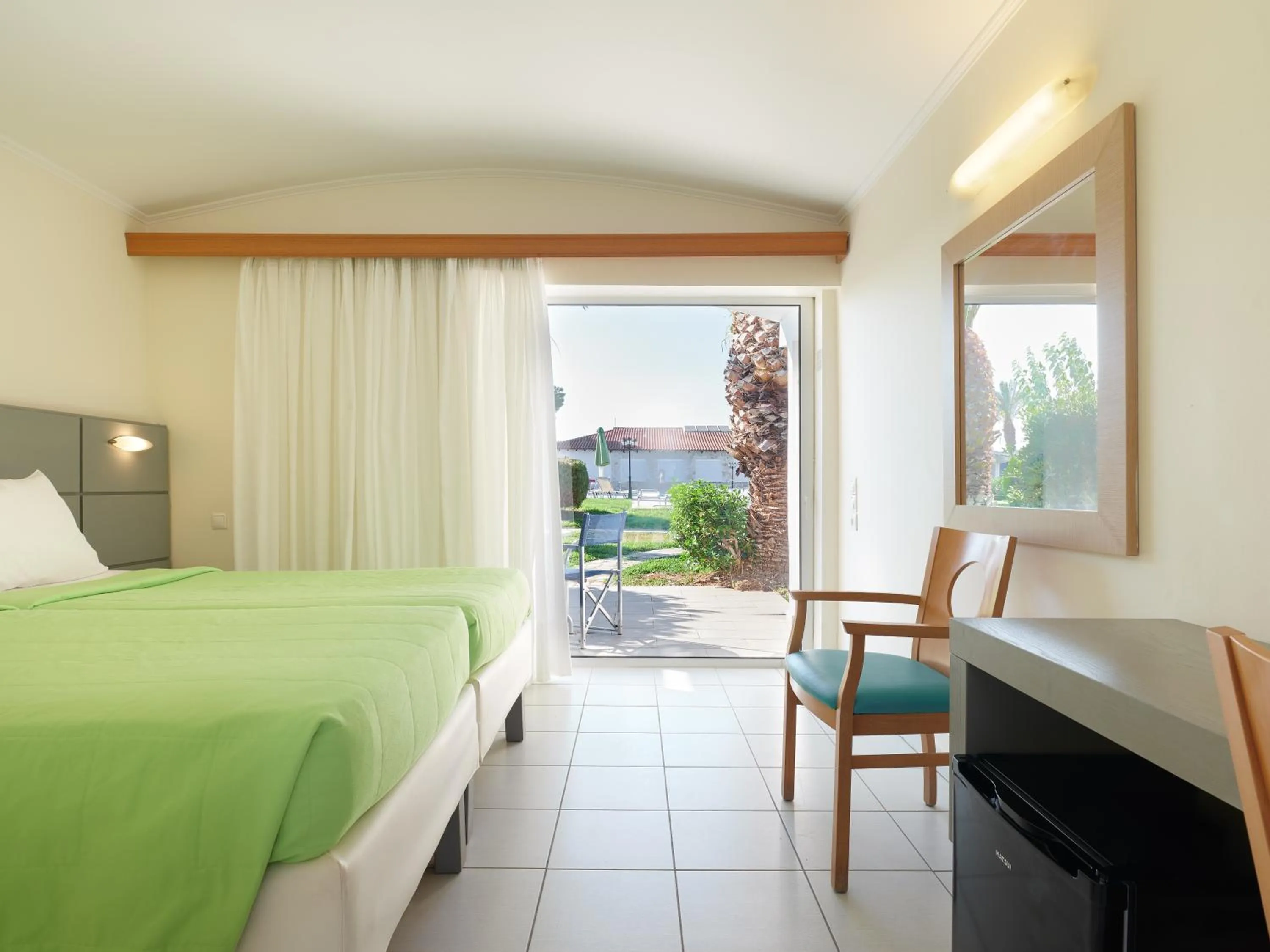 Bedroom in Kinetta Beach Resort and Spa