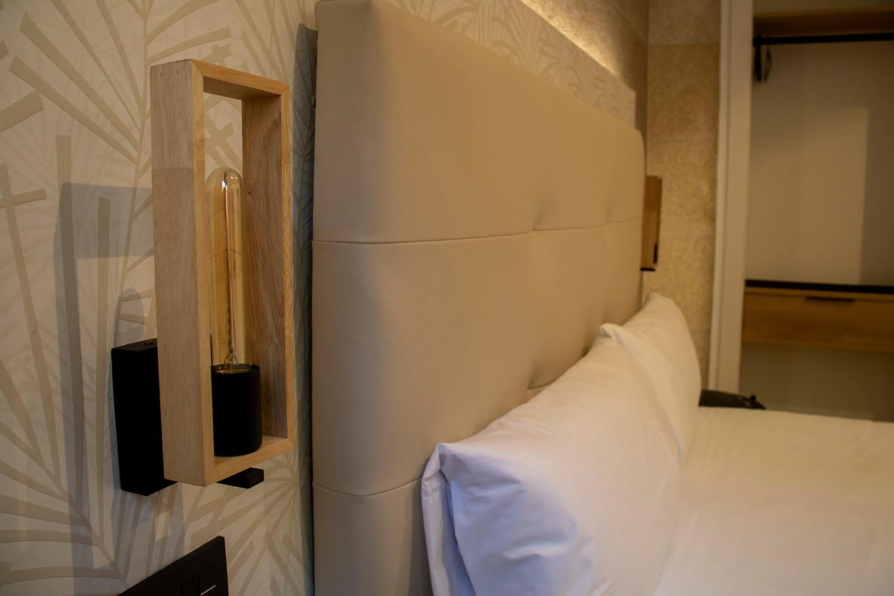 Decorative detail, Bed in Hotel Alda Orzán