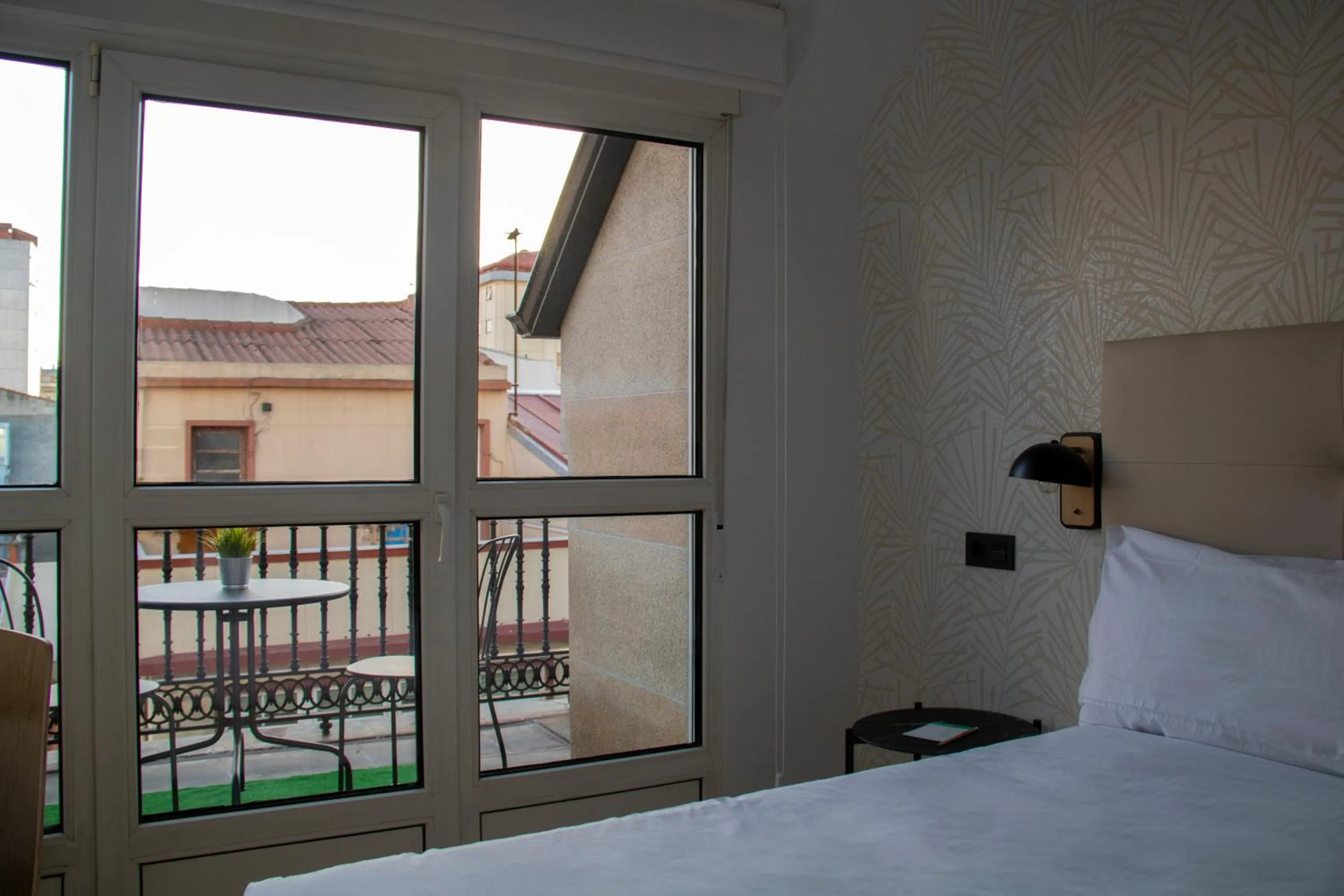 Balcony/Terrace, Bed in Hotel Alda Orzán