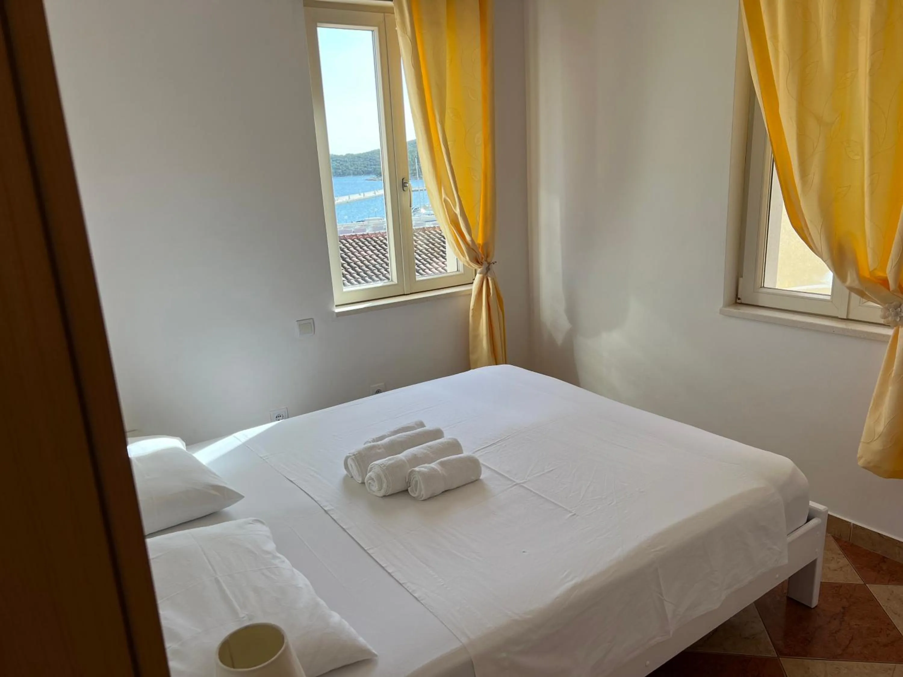 Bed in Apartments and Rooms Katija & Egon