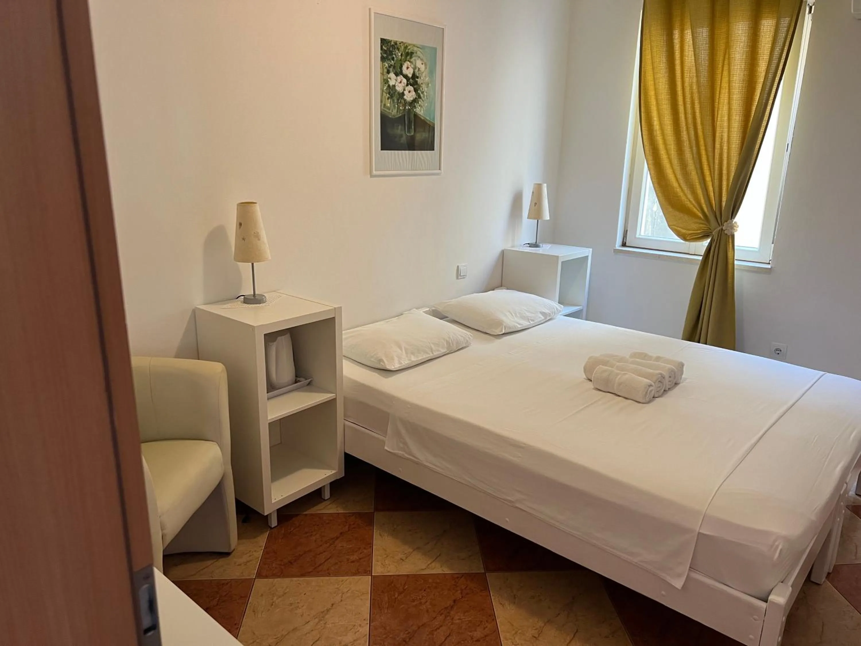 Bed in Apartments and Rooms Katija & Egon