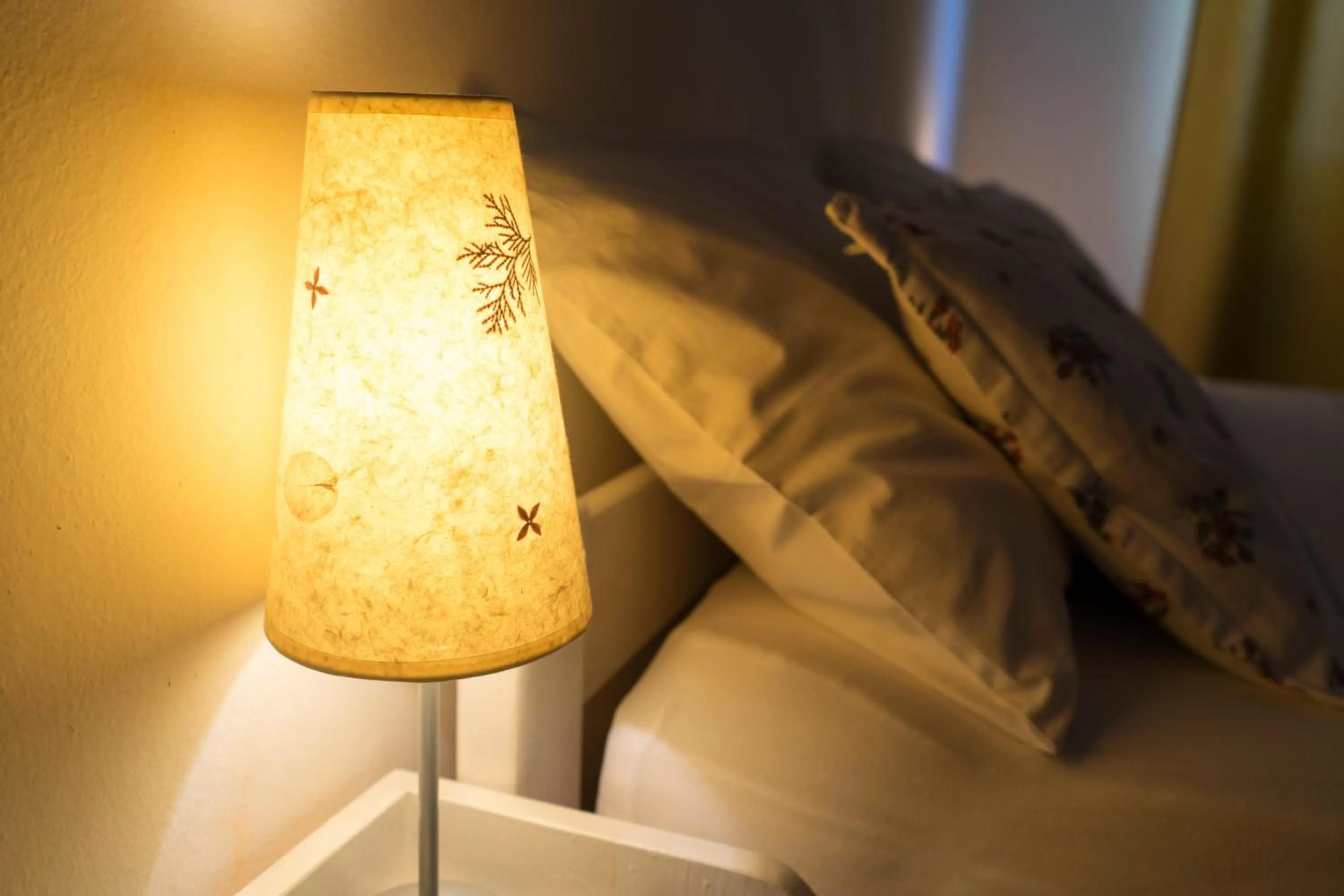 Decorative detail, Bed in Apartments and Rooms Katija & Egon