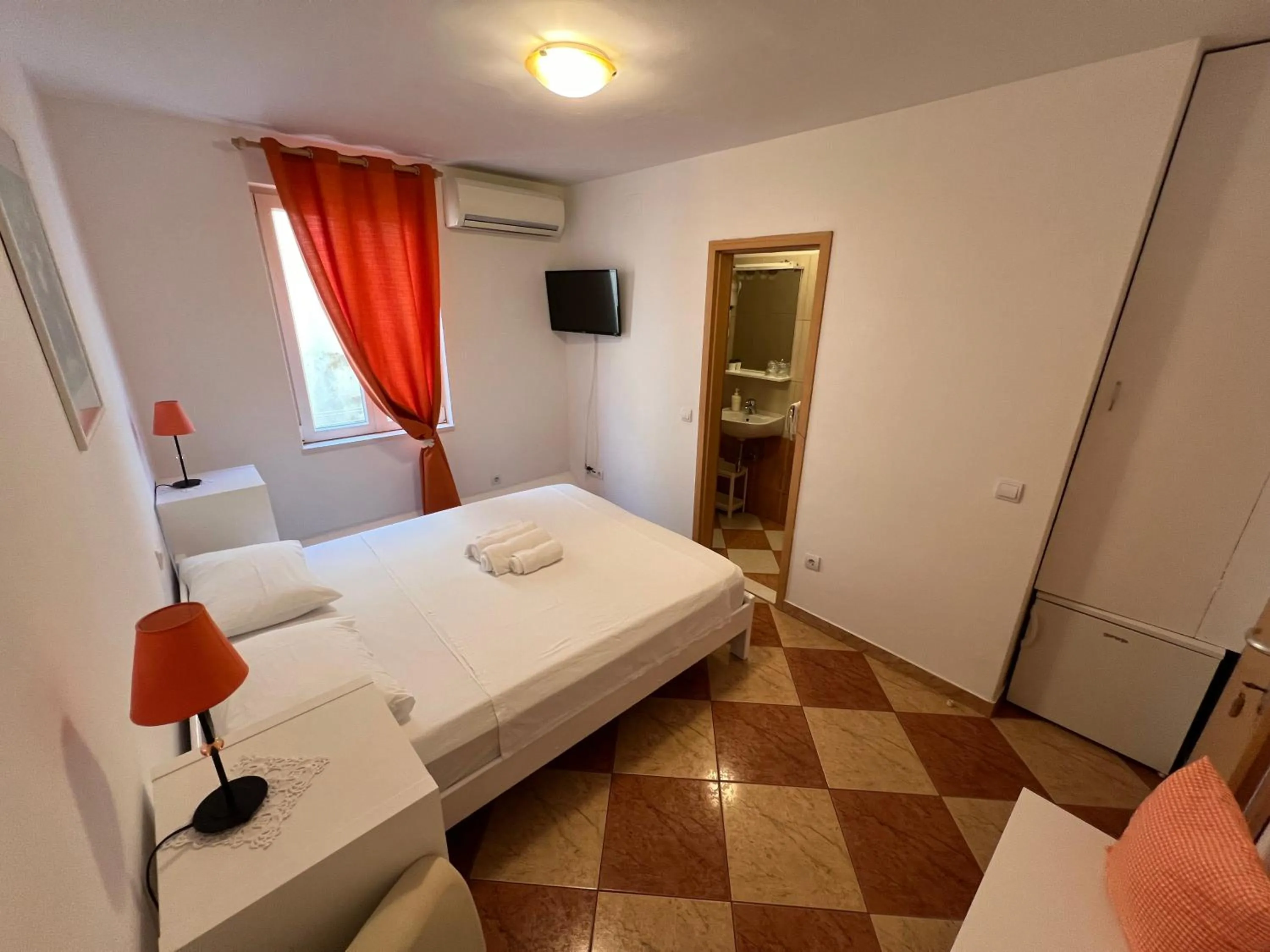 Bed in Apartments and Rooms Katija & Egon