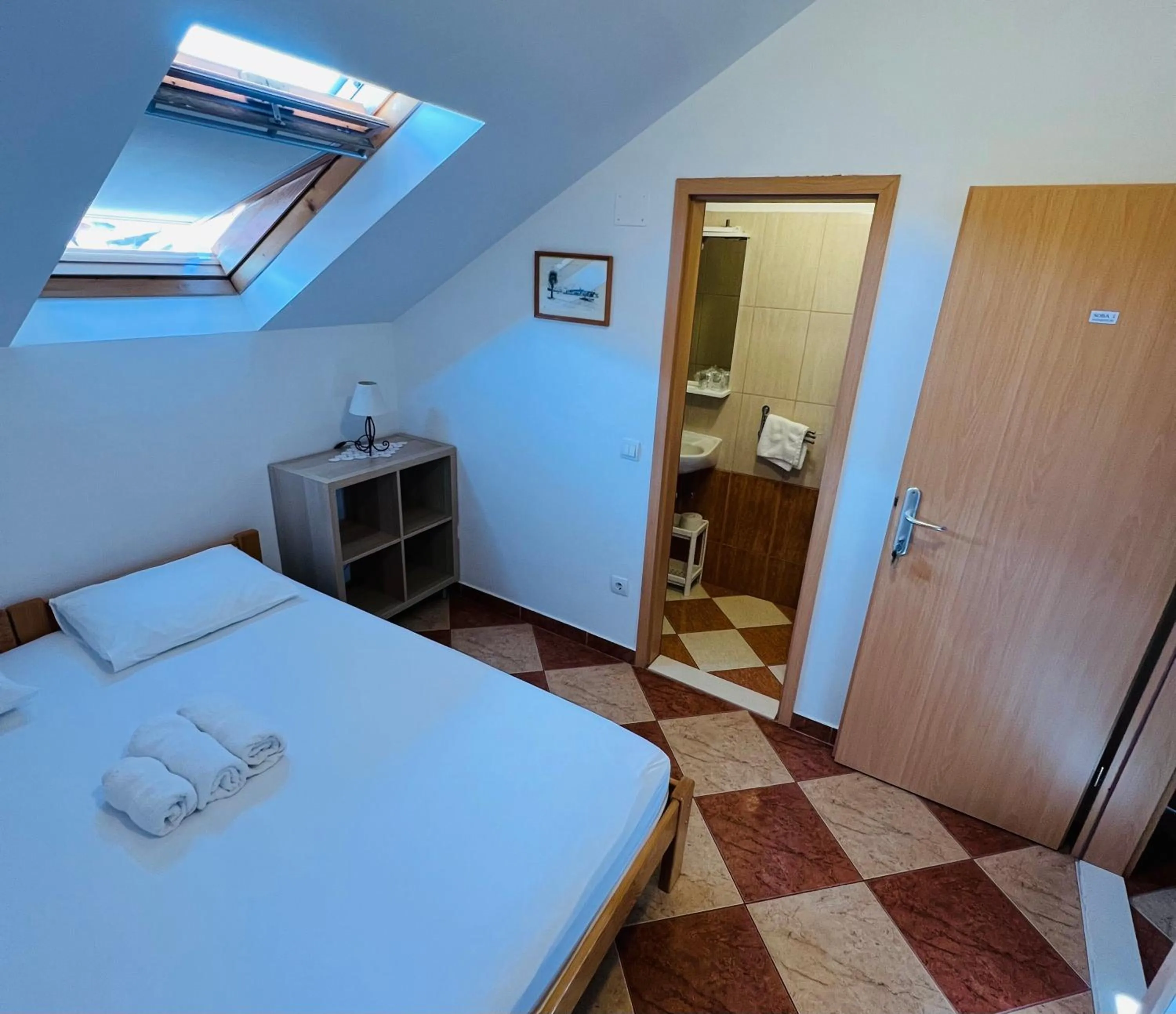 Bed in Apartments and Rooms Katija & Egon