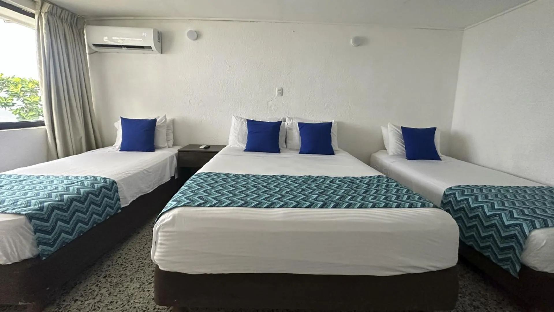 Bed in Hotel Blue Reef by On vacation