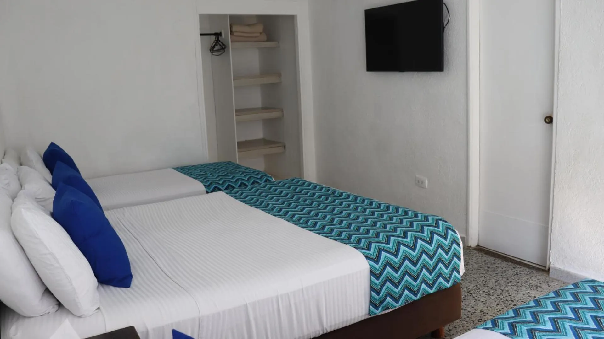 Bed in Hotel Blue Reef by On vacation