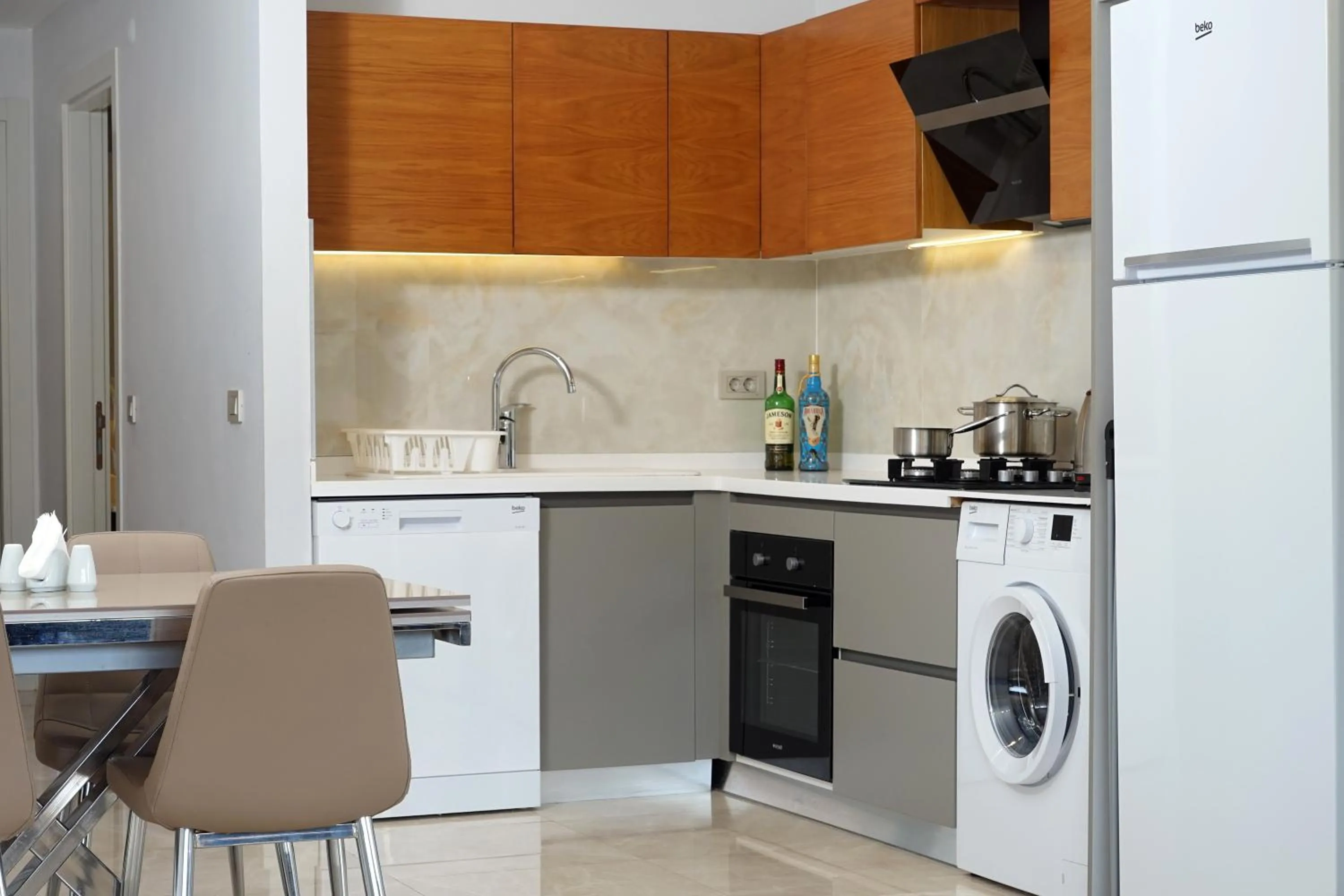 Kitchen or kitchenette in MENE SUITES