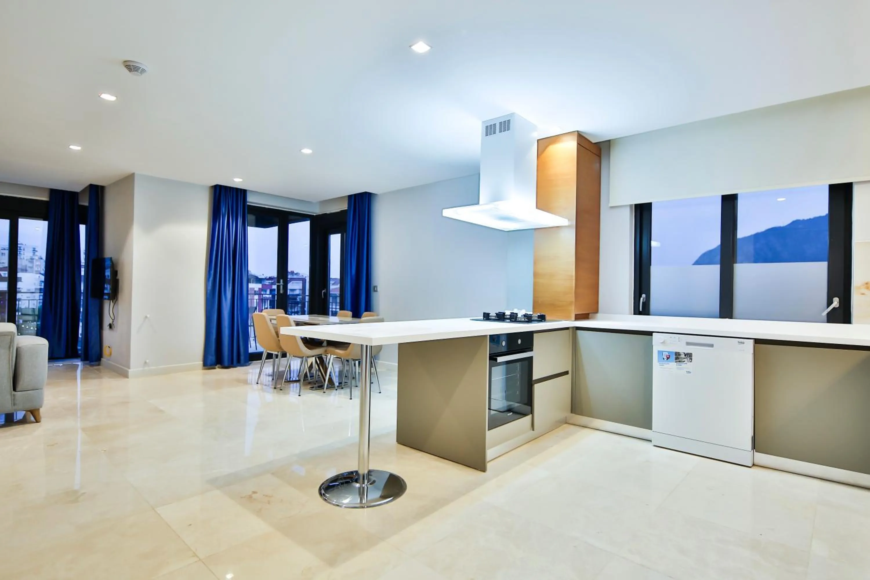 Kitchen or kitchenette in MENE SUITES