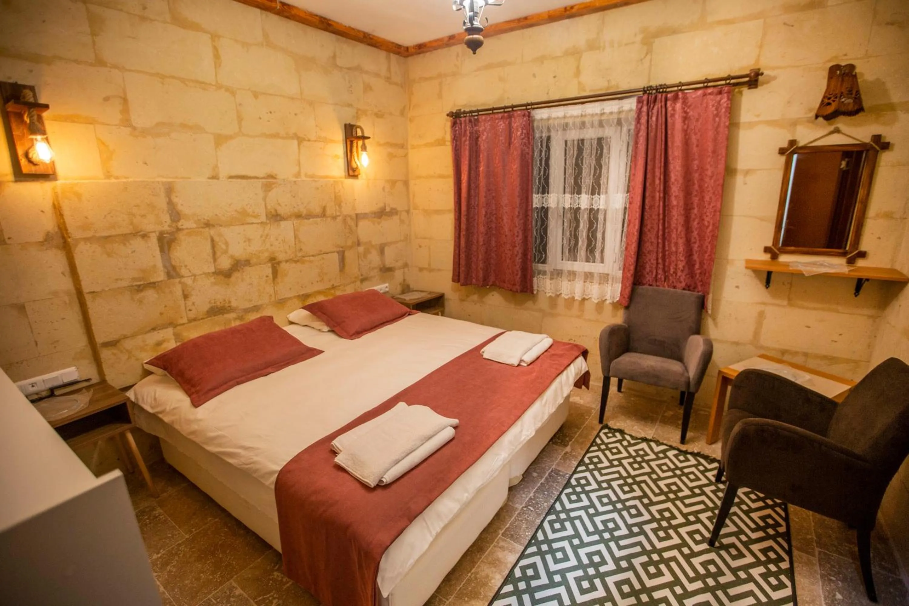 Bed in Capiedra Hotel