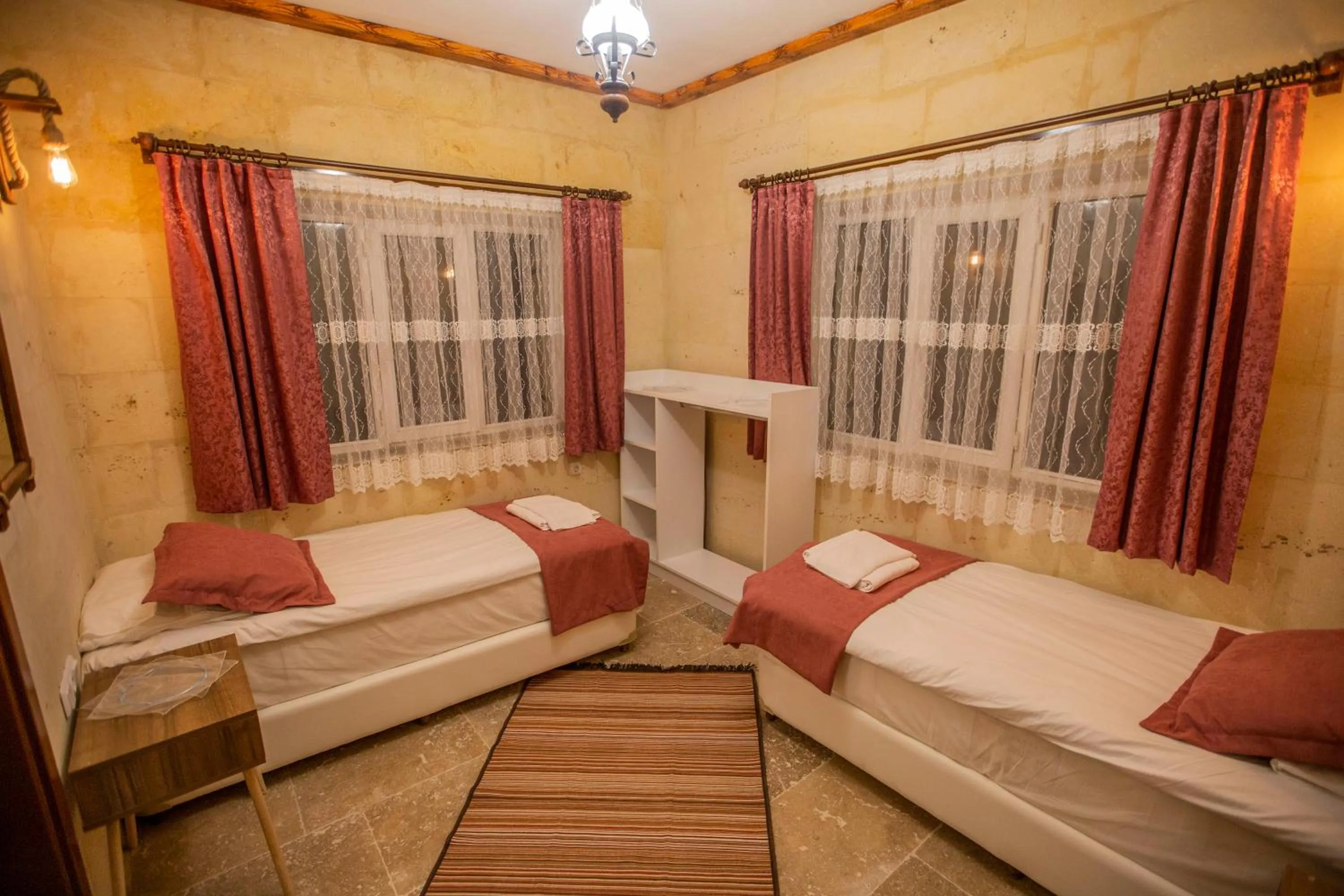 Bed in Capiedra Hotel