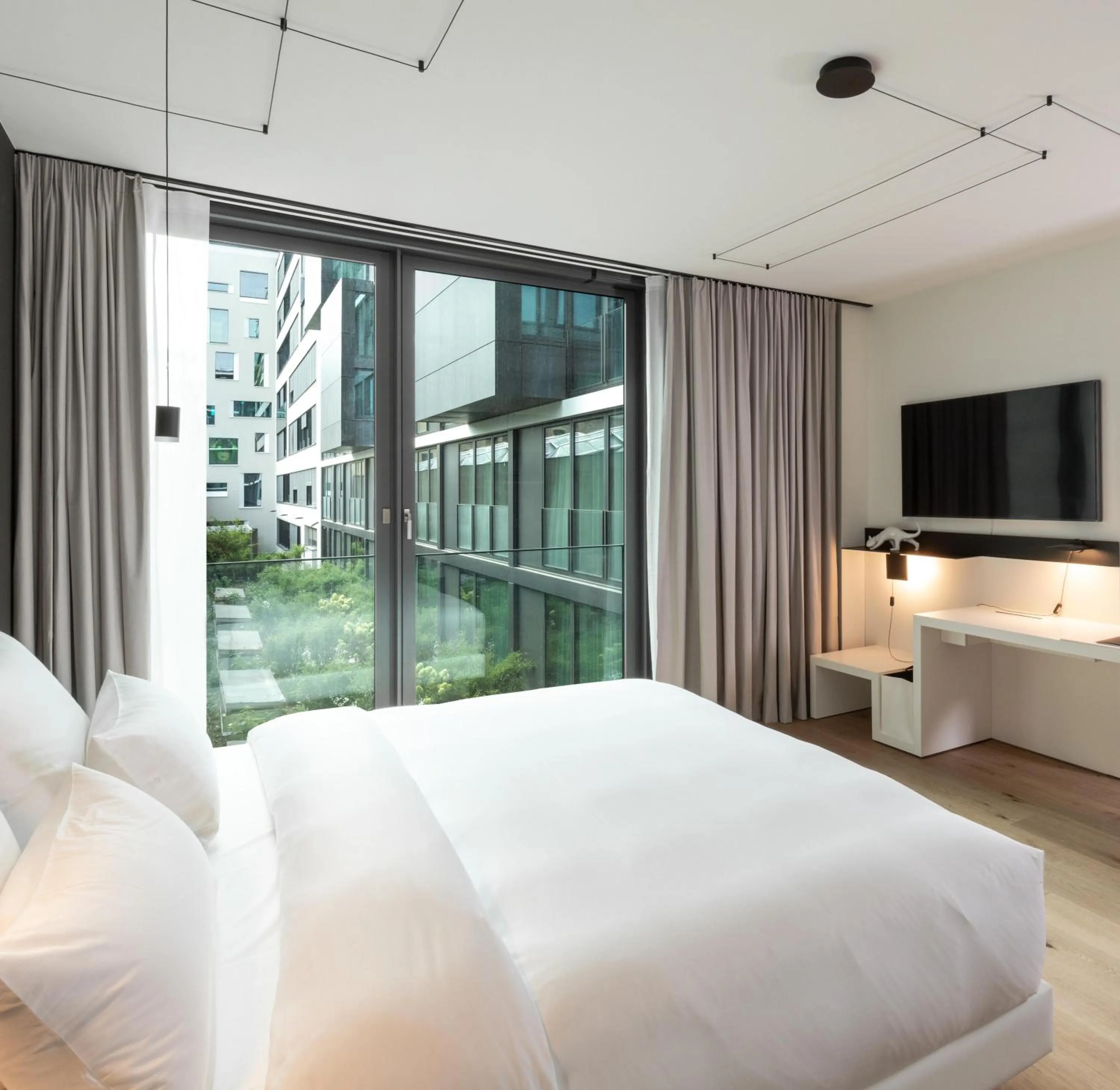 Bed in KPM Hotel & Residences Berlin, a Member of Design Hotels