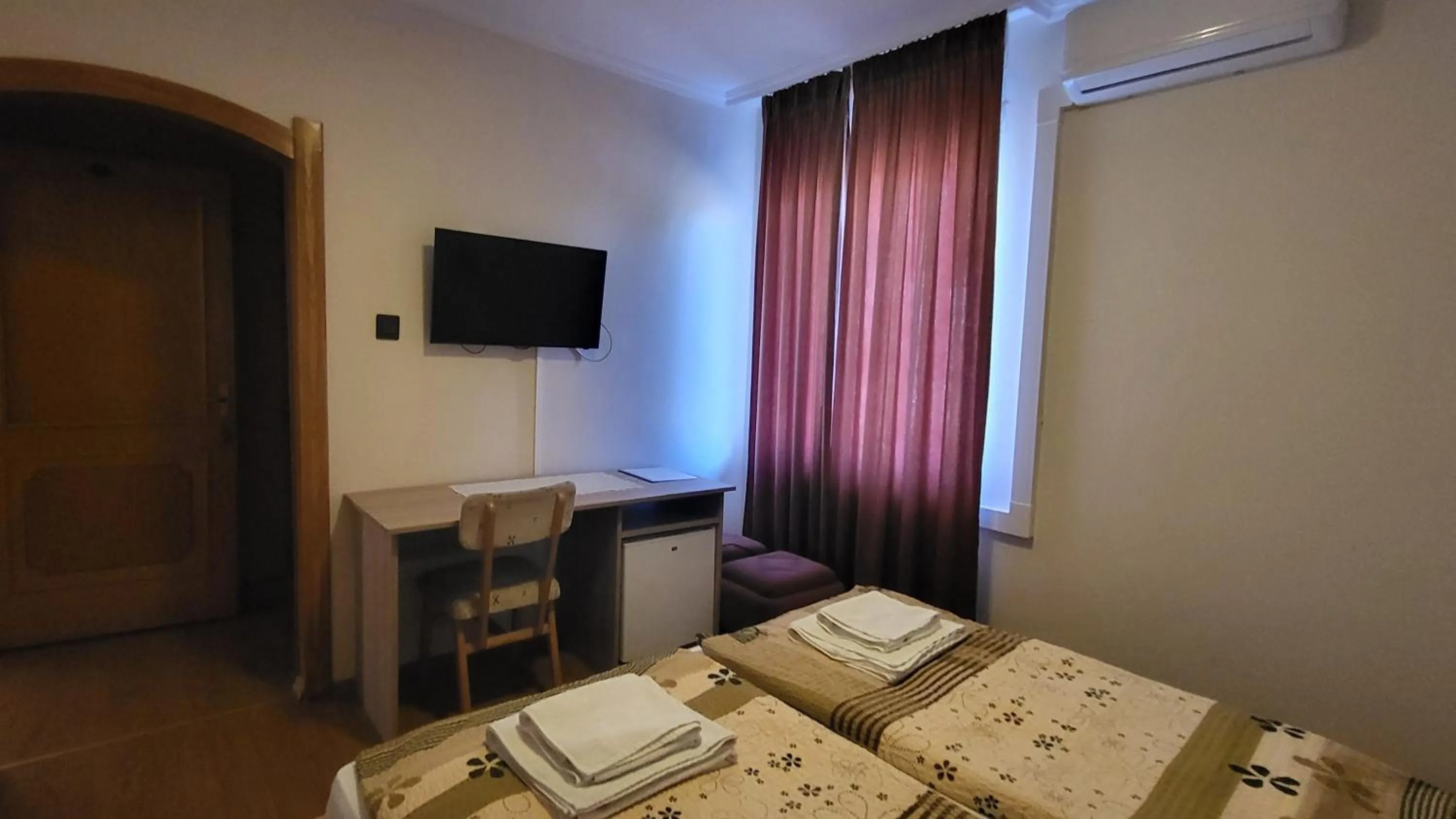 Bed in Hotel Orchidea