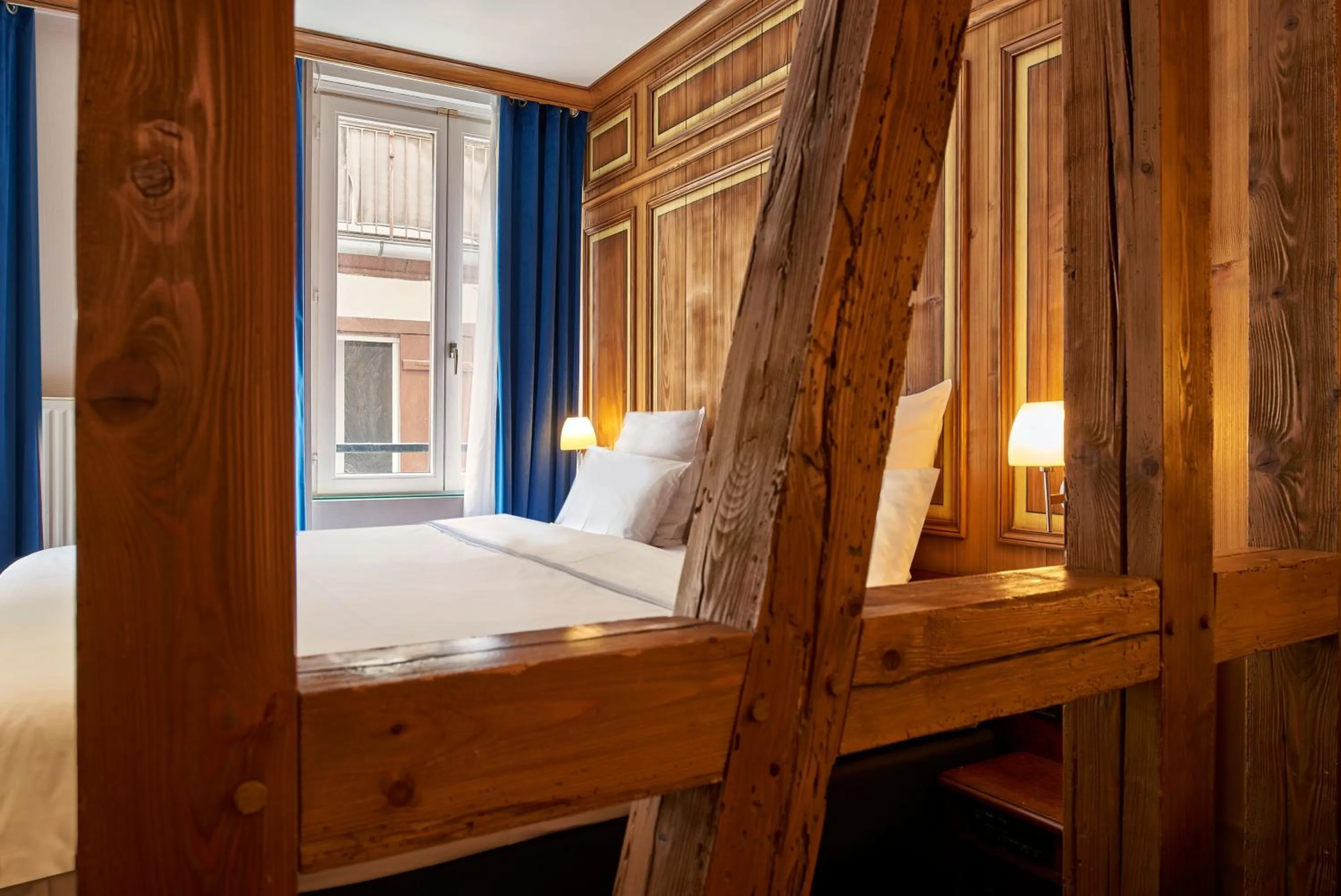 Bed in Hôtel de l'Europe by HappyCulture