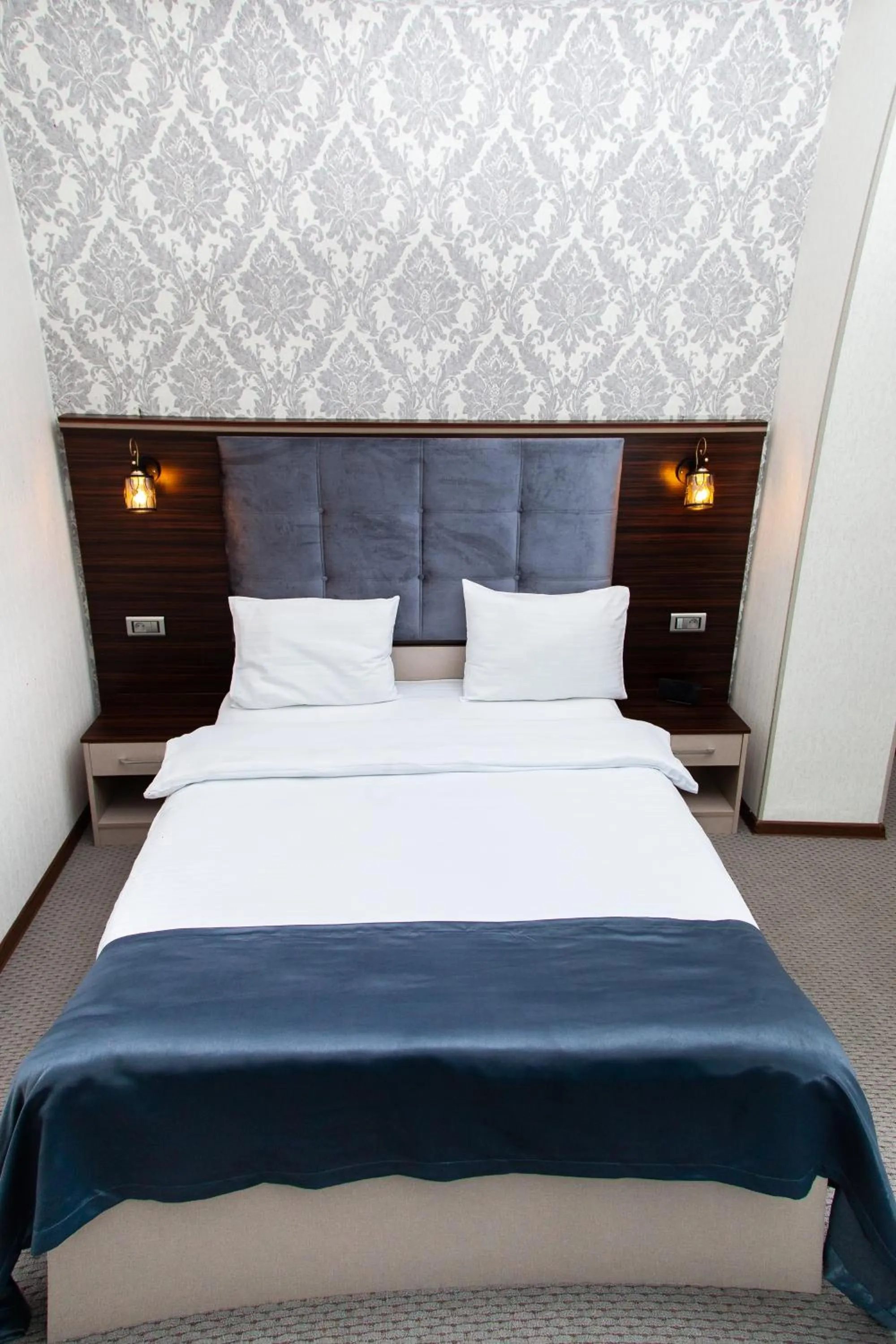 Bed in Mildom Hotel Baku