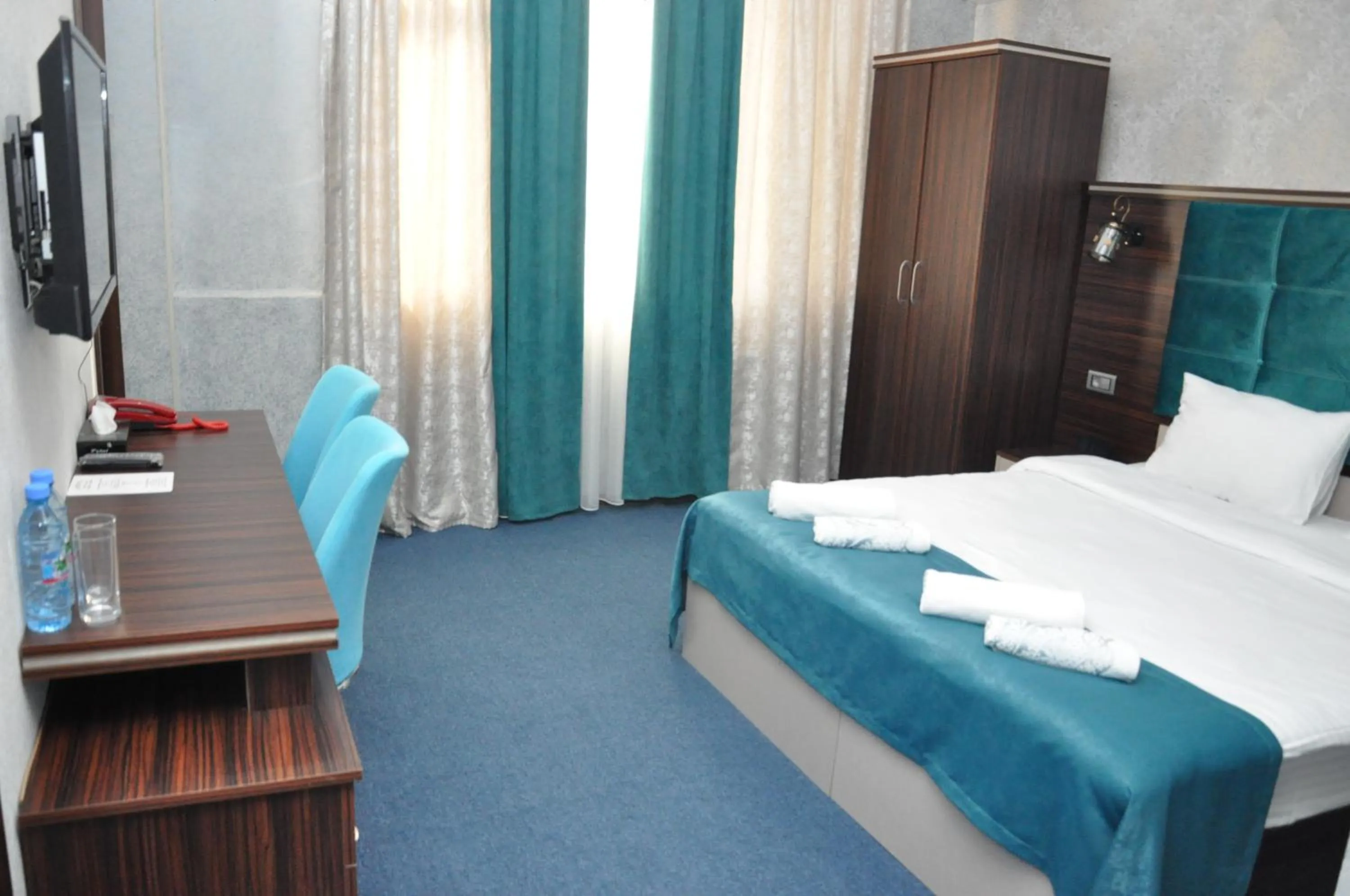 Photo of the whole room, Bed in Mildom Hotel Baku
