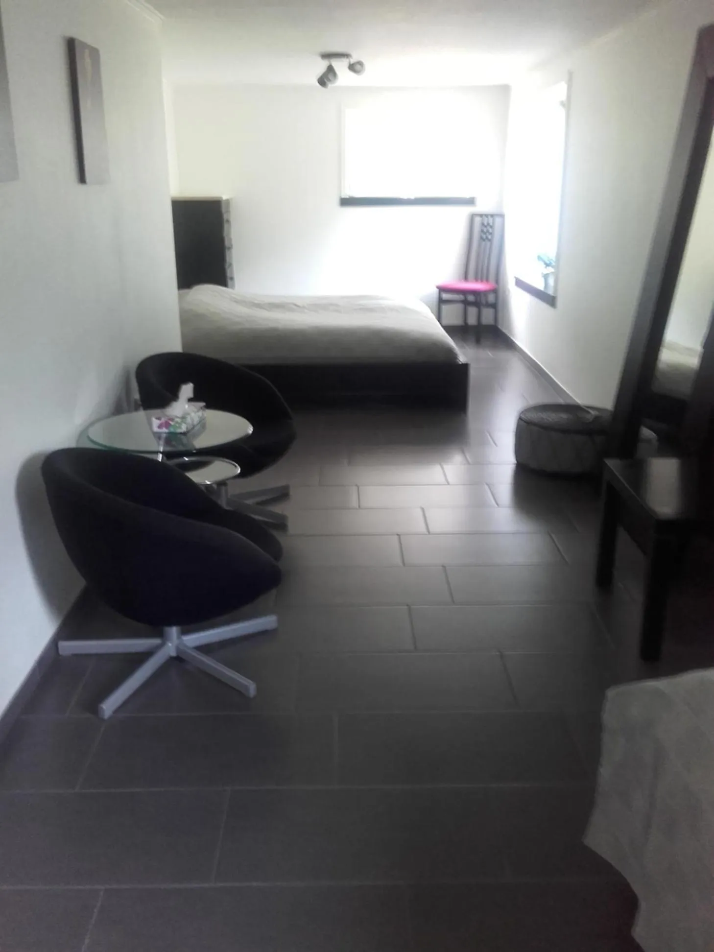 Seating area, Bed in Nilles bed & breakfast