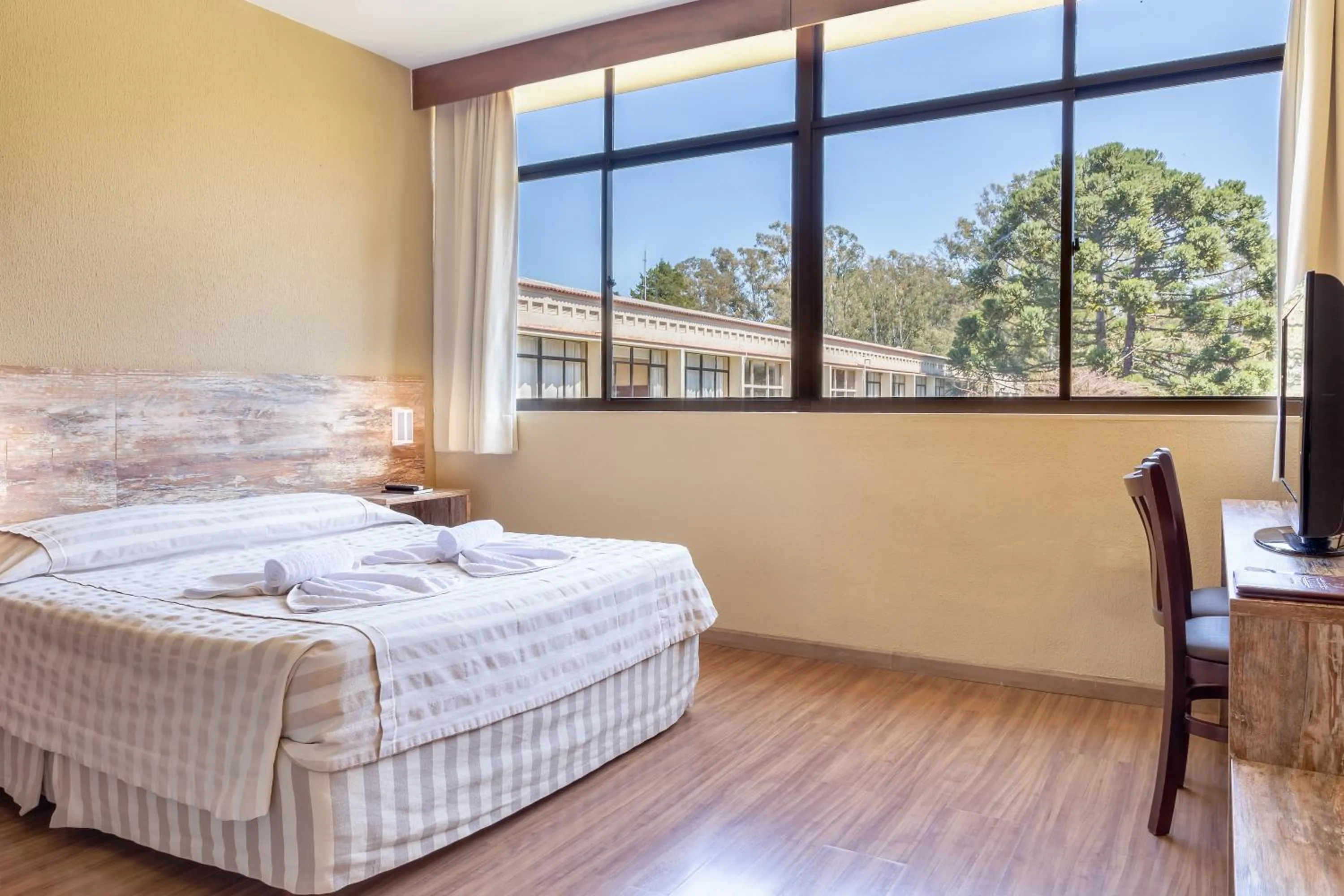 Photo of the whole room, Bed in Samuara Hotel Caxias do Sul