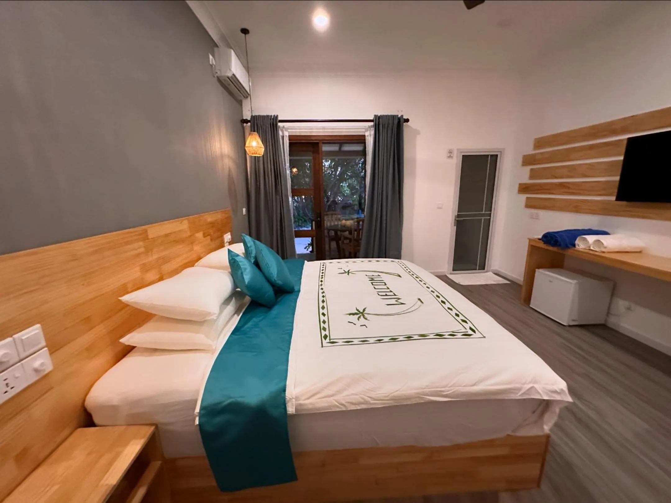 Bed in Dhigurah Beach Inn