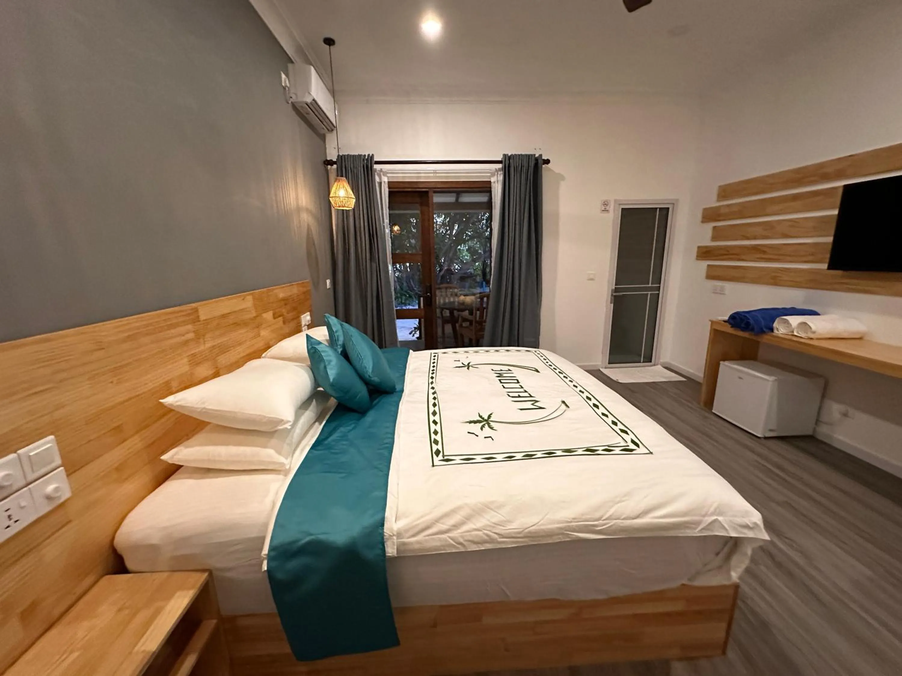 Bed in Dhigurah Beach Inn