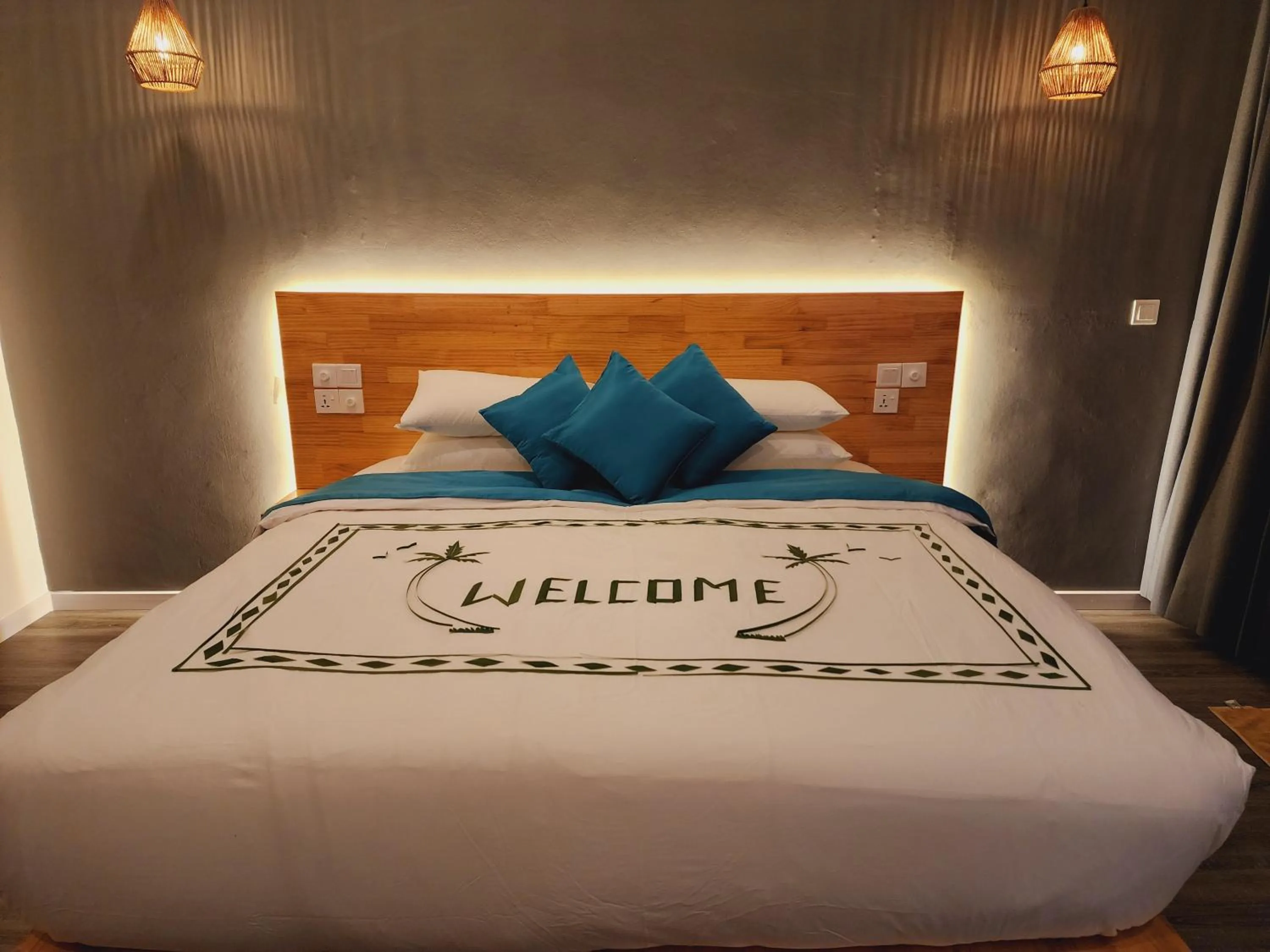 Bed in Dhigurah Beach Inn