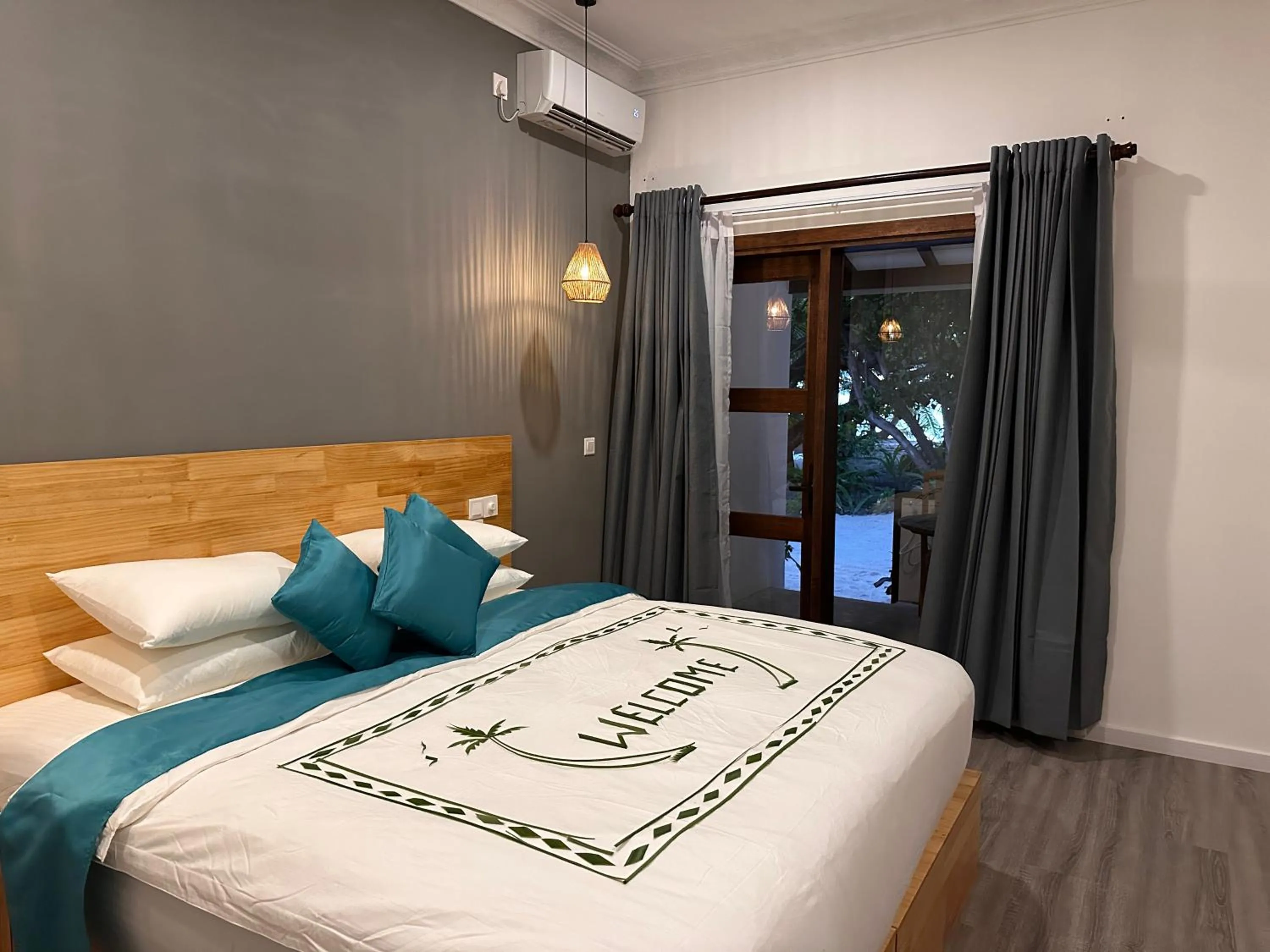 Bed in Dhigurah Beach Inn