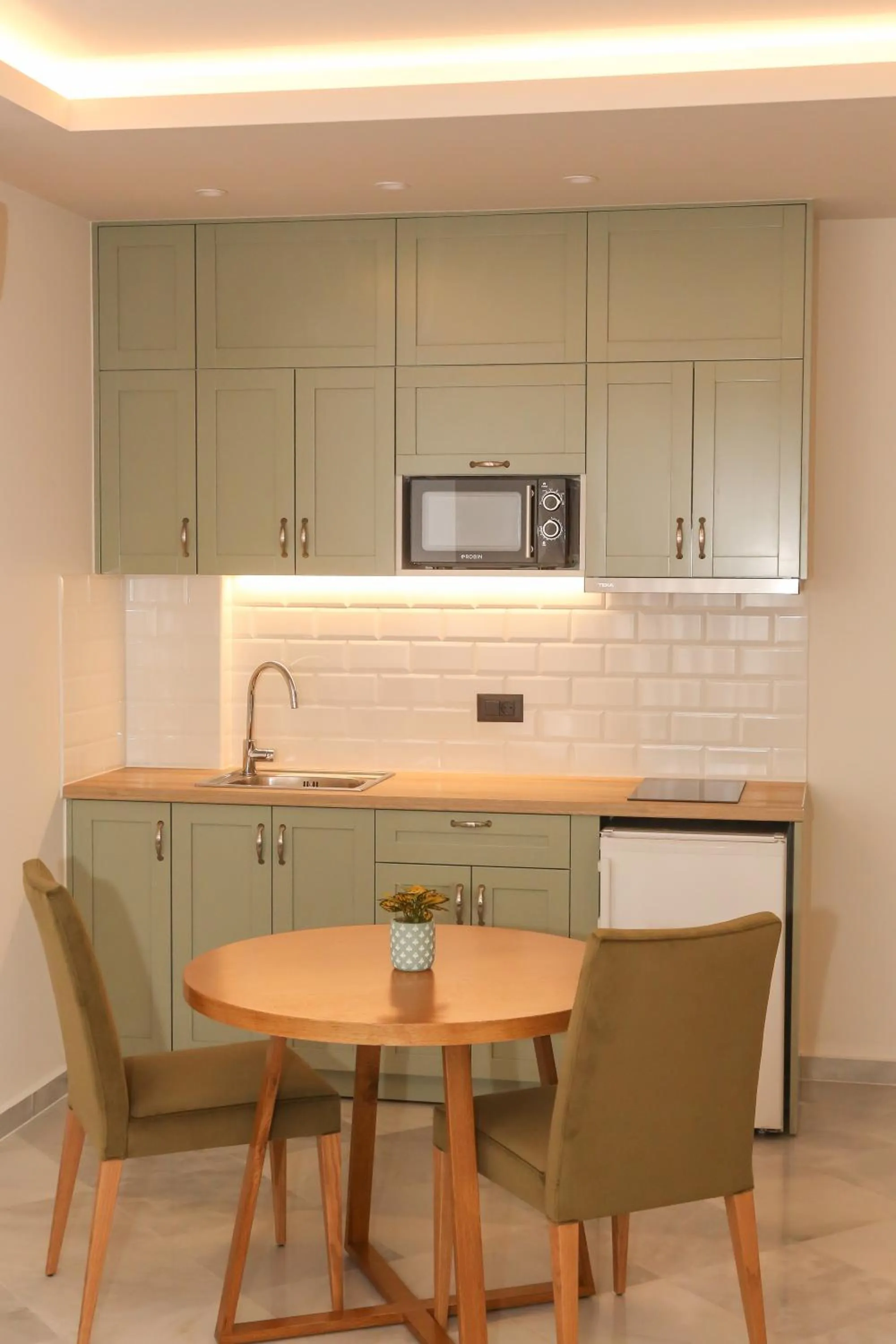 Kitchen or kitchenette in Heaven Apartments