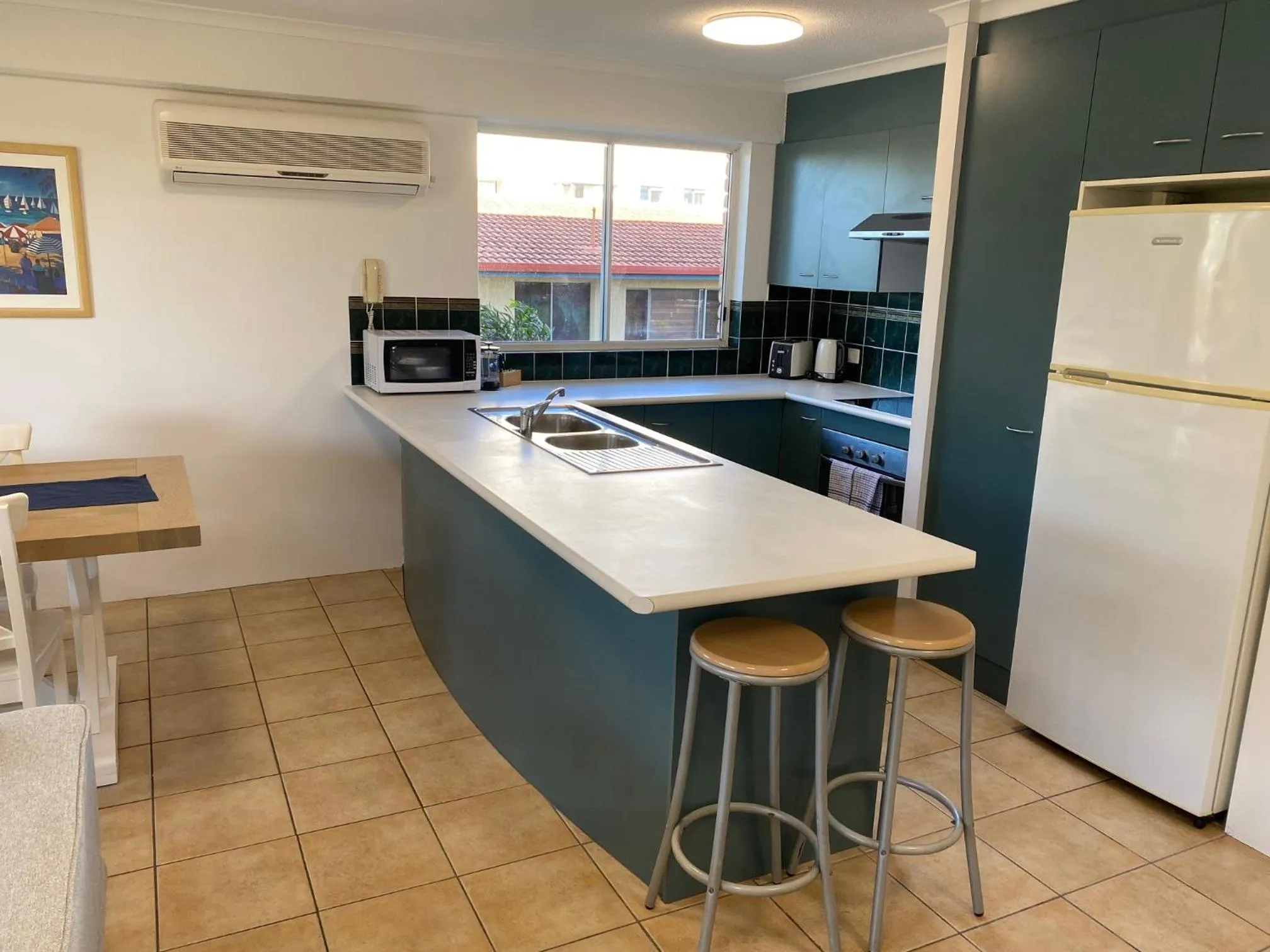 Kitchen or kitchenette in Belvedere Apartments