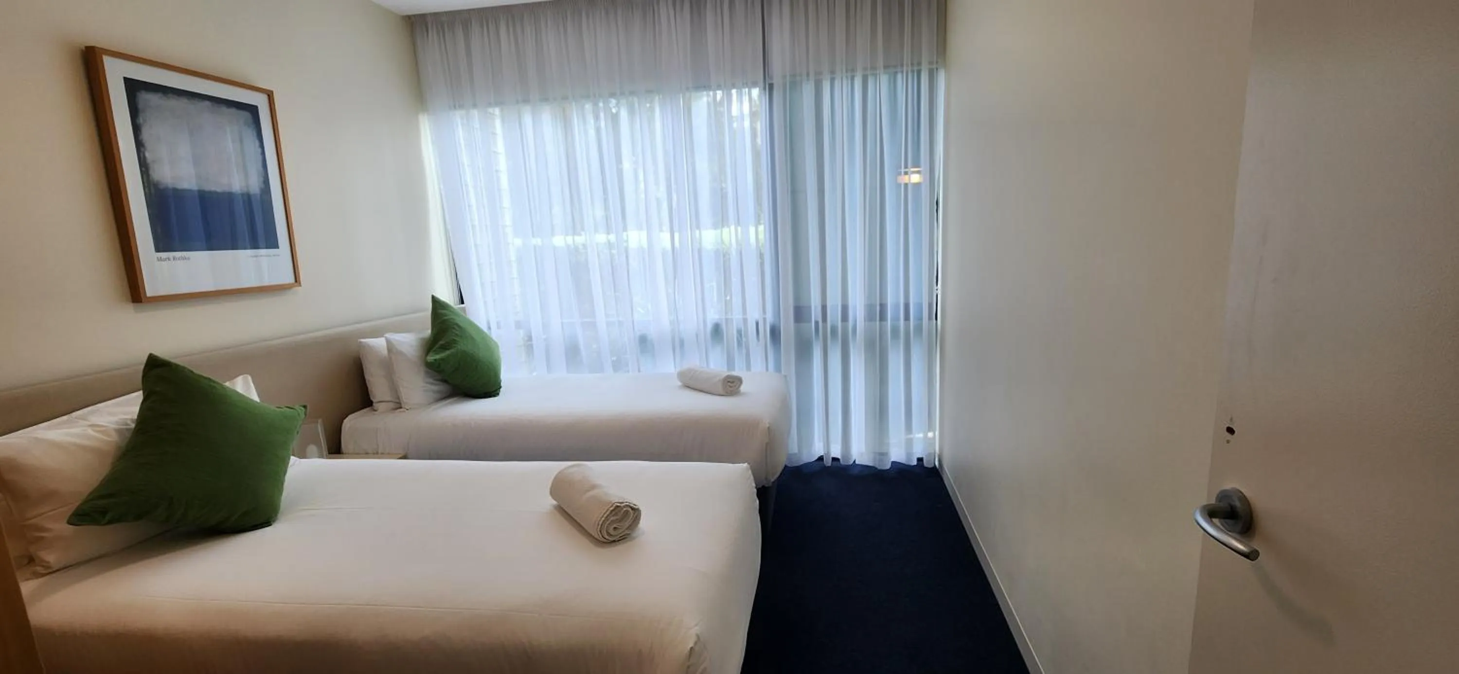 Bed in Phillip Island Apartments