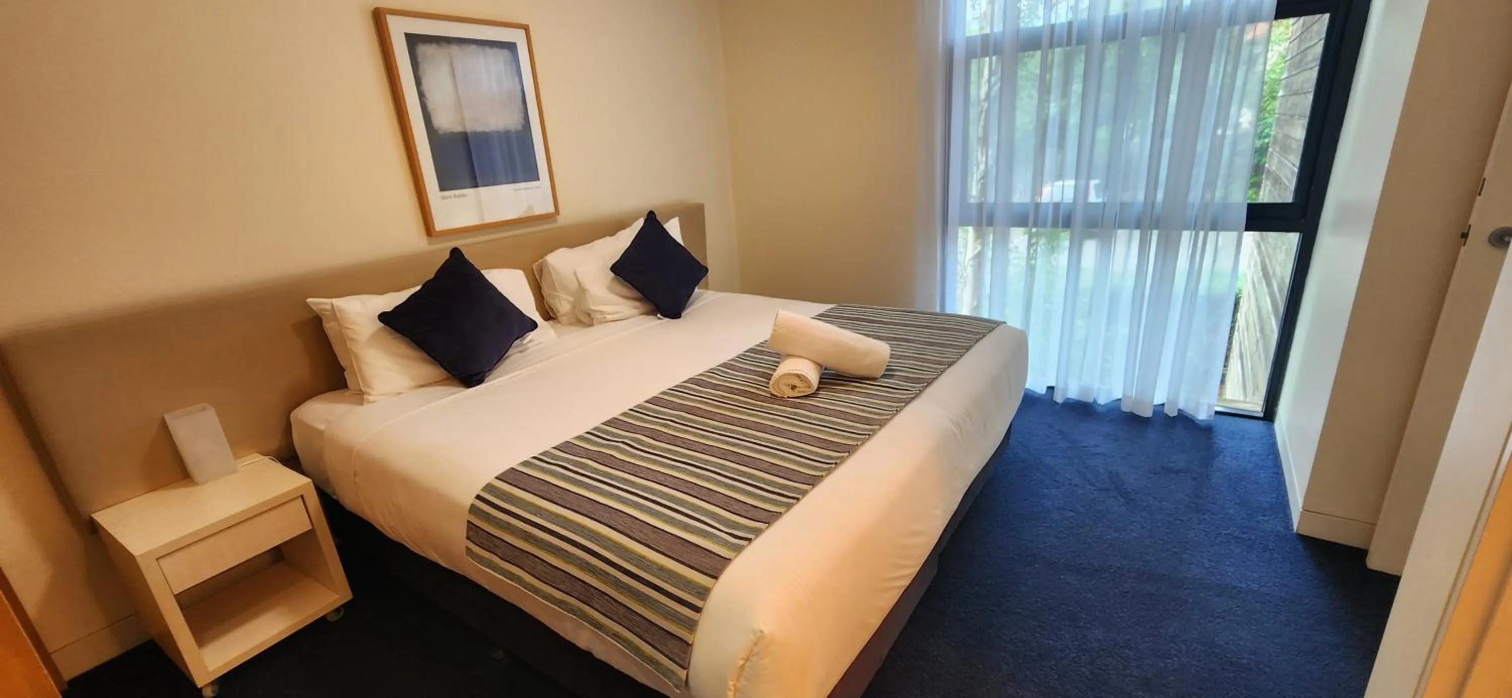 Bed in Phillip Island Apartments