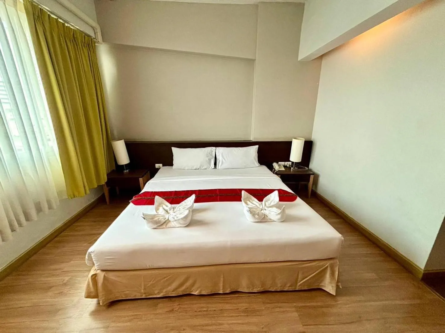 Bed in Aloha Hatyai Hotel