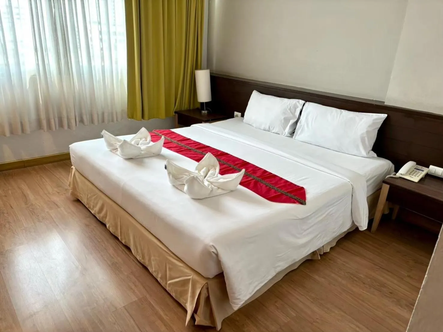 Bed in Aloha Hatyai Hotel