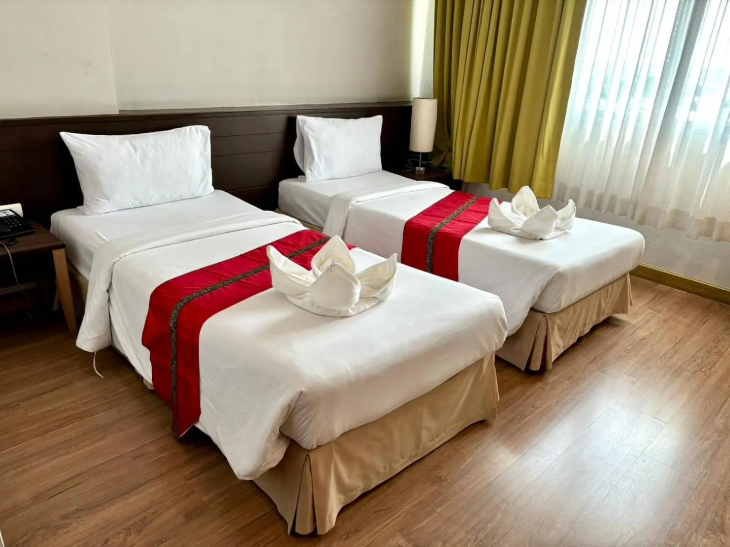 Bed in Aloha Hatyai Hotel