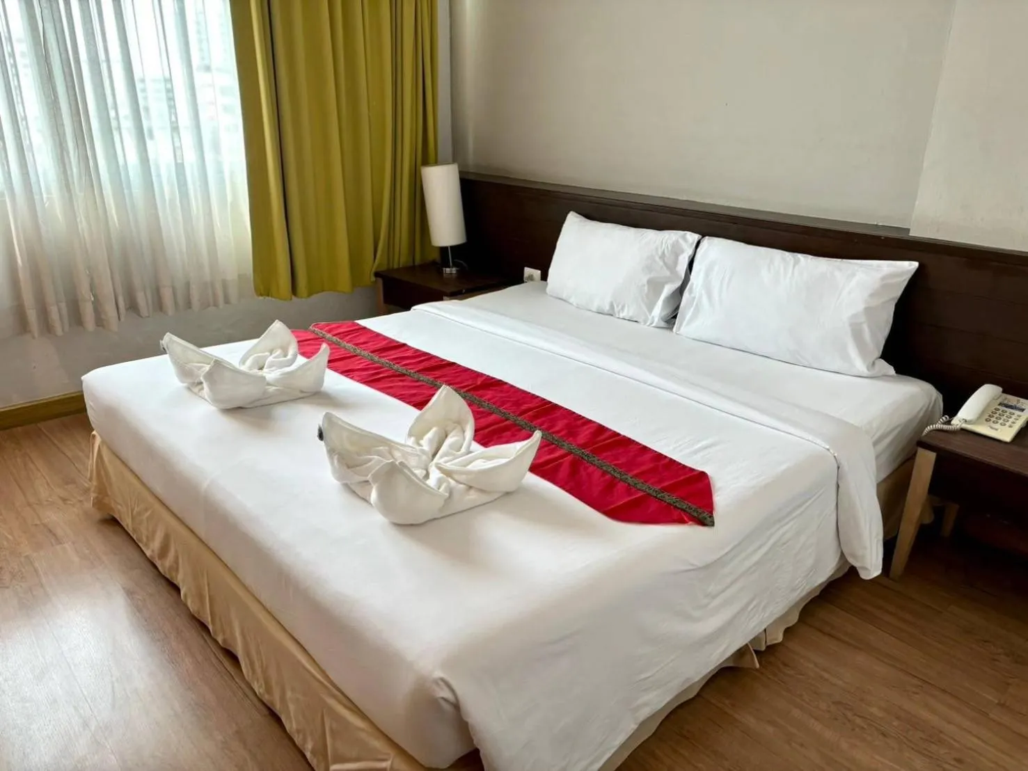 Bed in Aloha Hatyai Hotel
