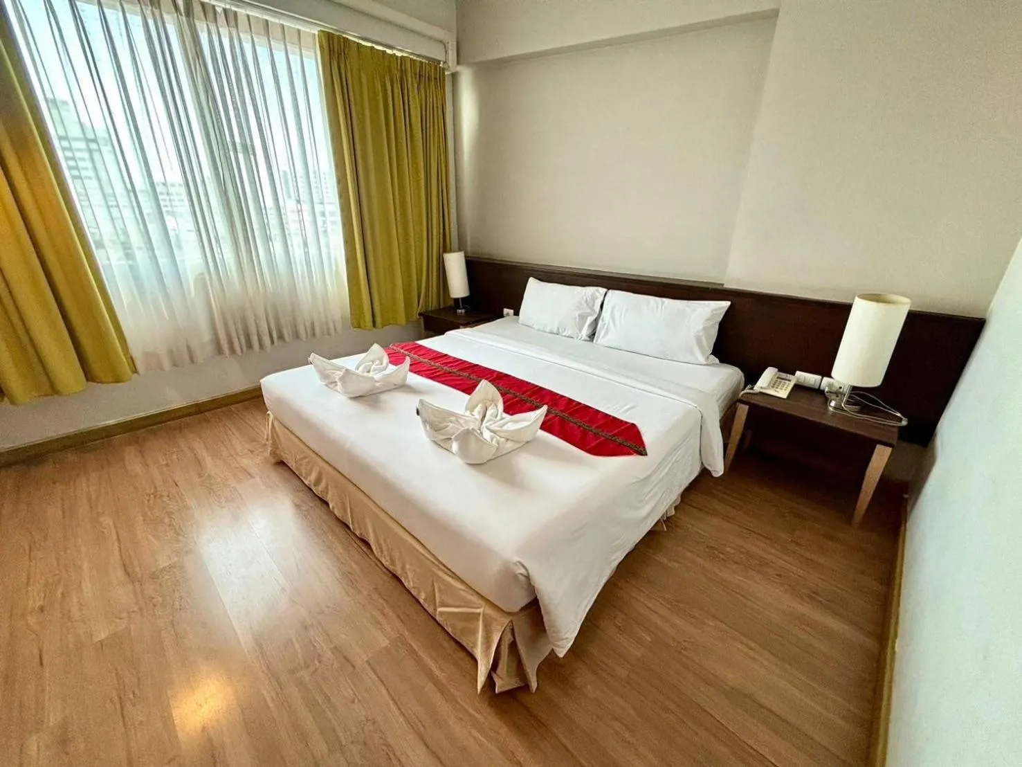 Bed in Aloha Hatyai Hotel