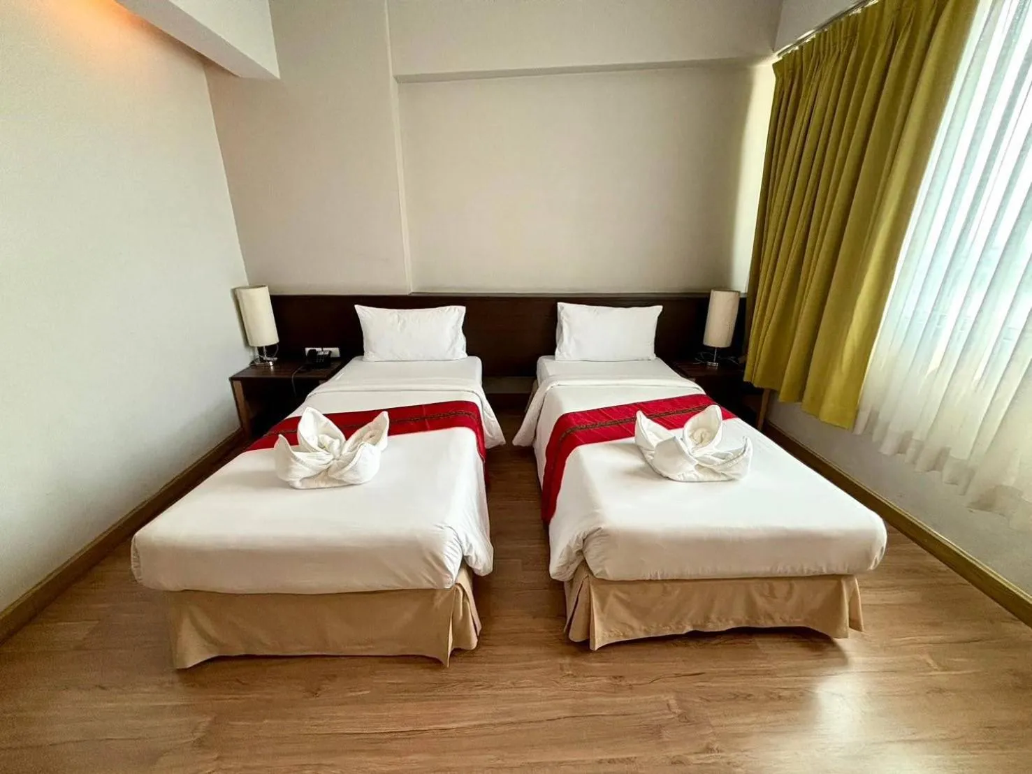 Bed in Aloha Hatyai Hotel