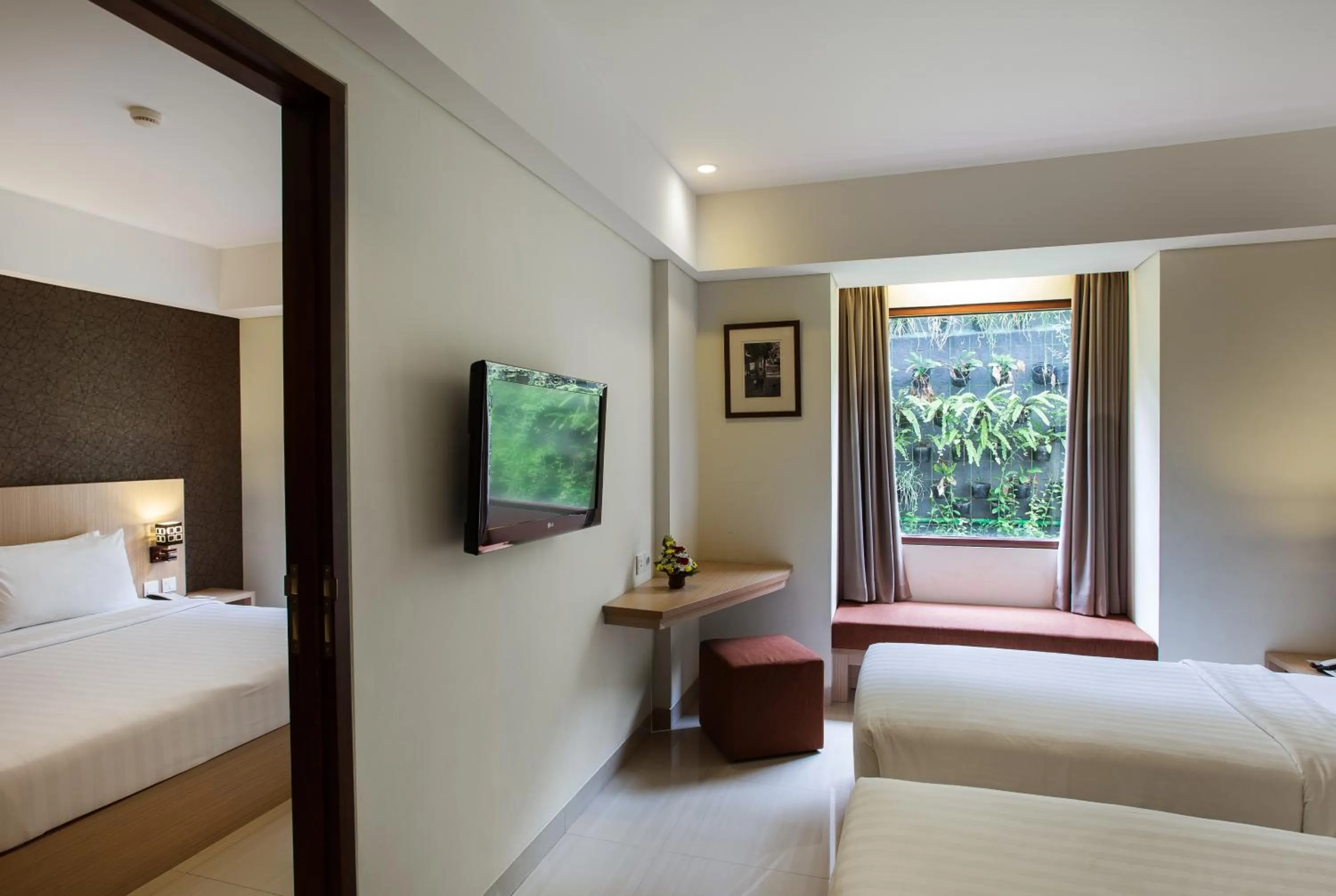 Garden view, Bed in Sense Sunset Hotel Seminyak