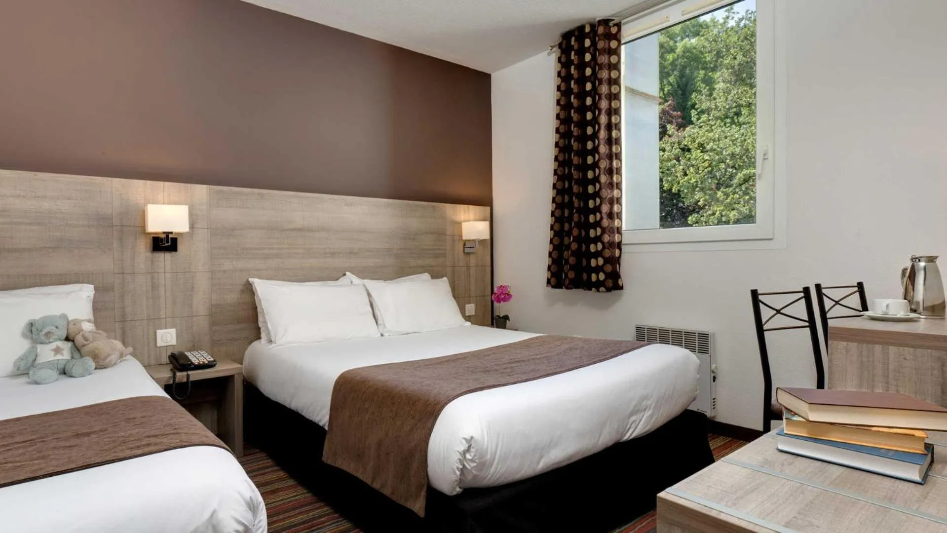 Bedroom in Hôtel Beau Site