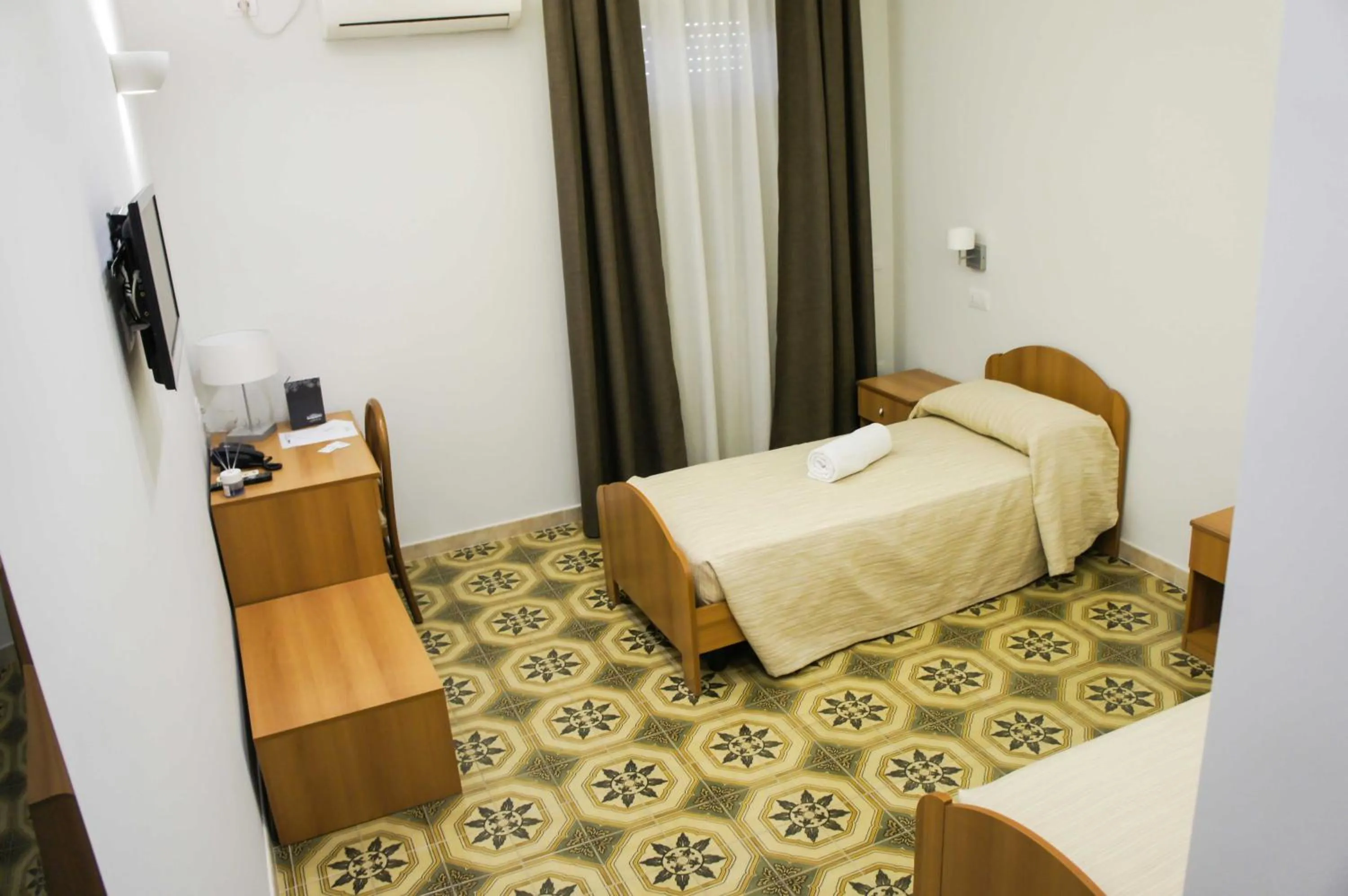 Bed in Albergo D'Onofrio