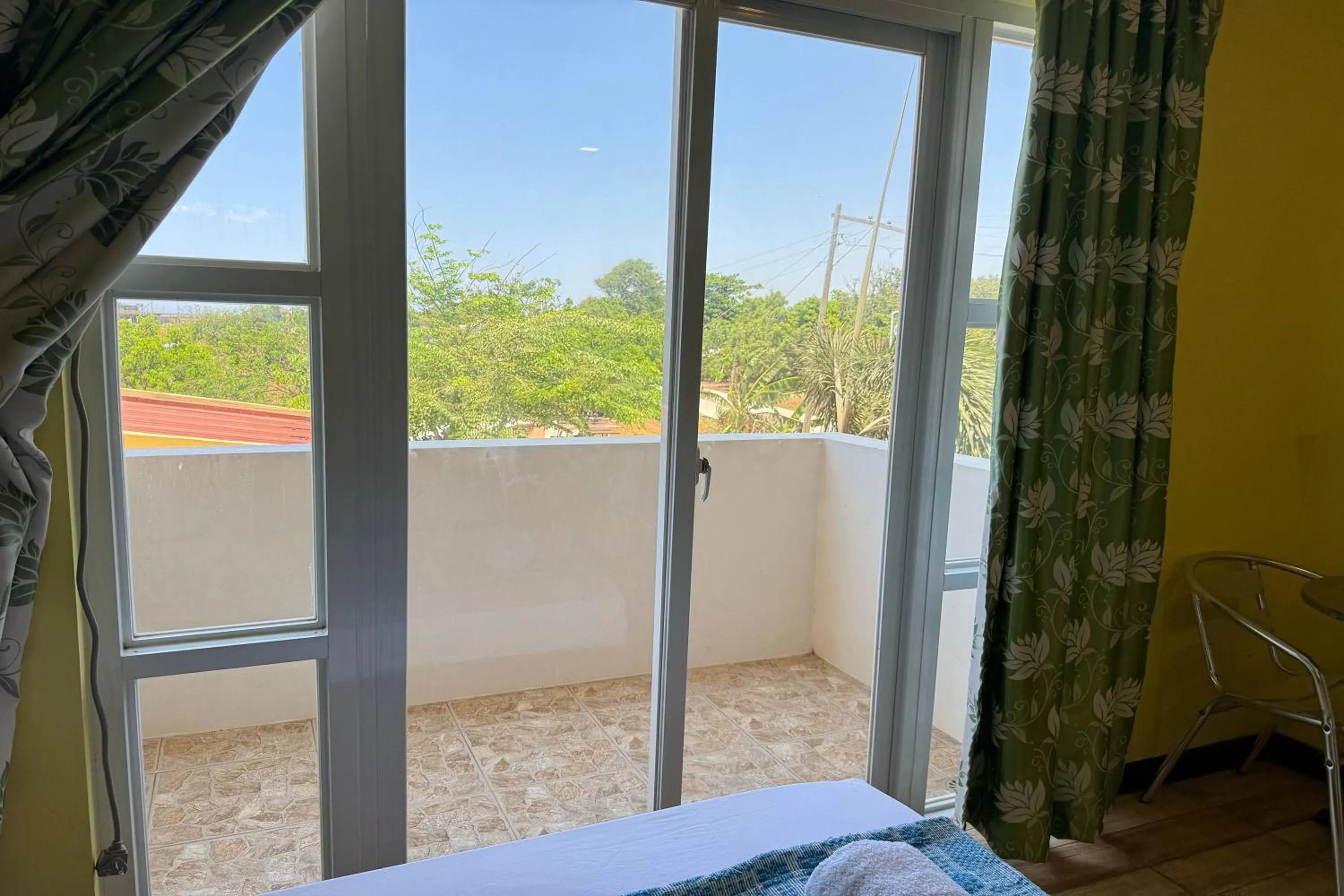 Balcony/Terrace, Bed in OveMar Resort Hotel near Vigan