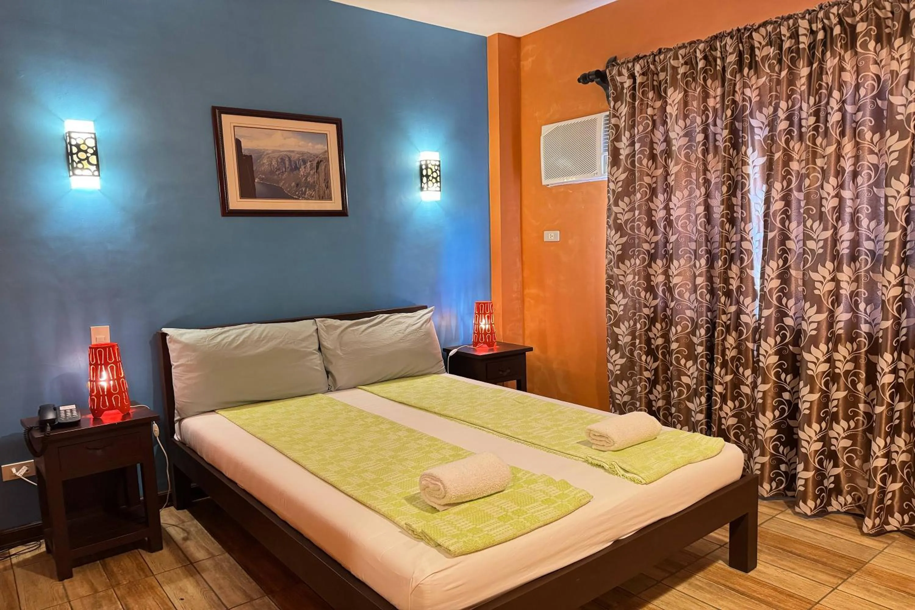 Bed in OveMar Resort Hotel near Vigan