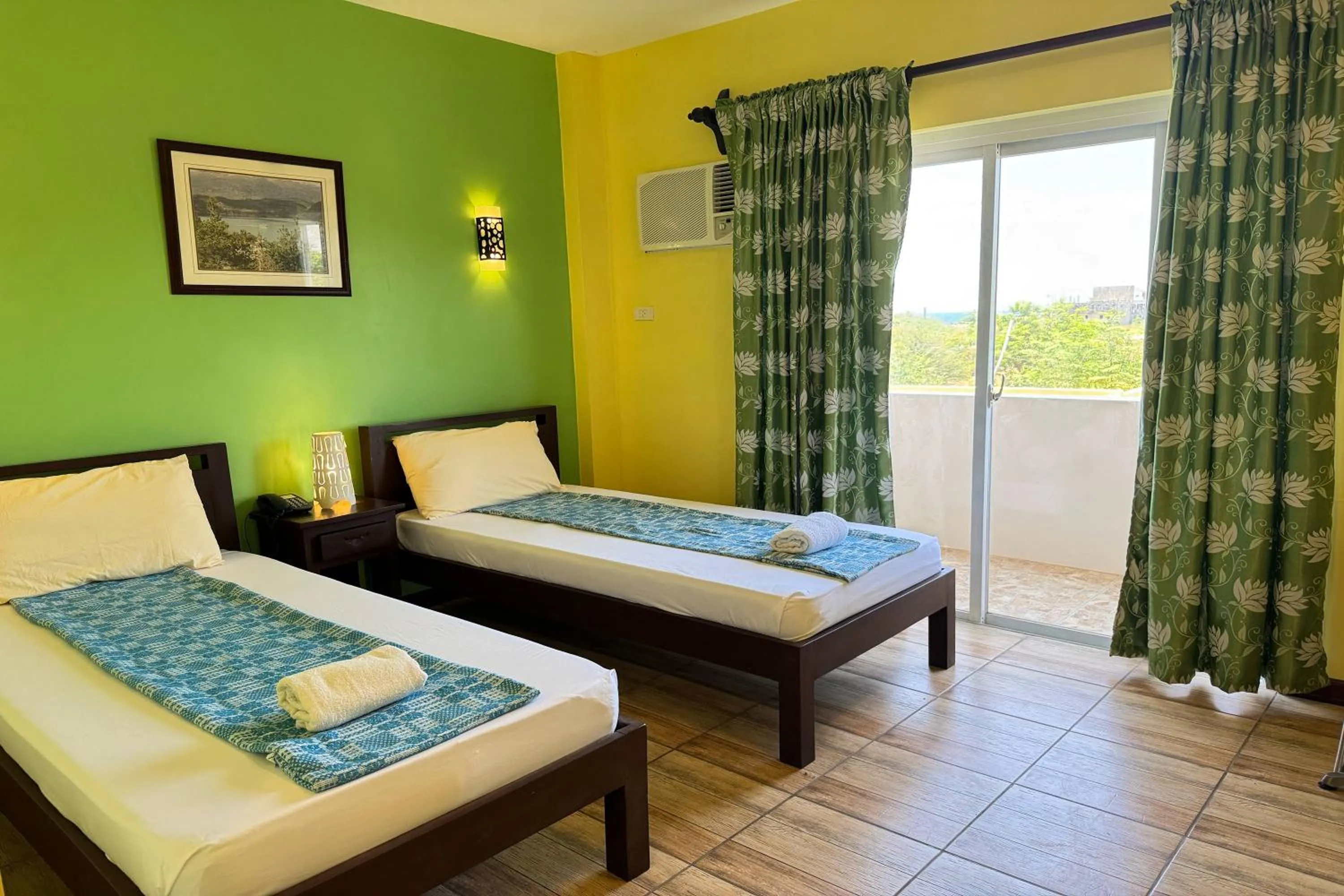 Bed in OveMar Resort Hotel near Vigan