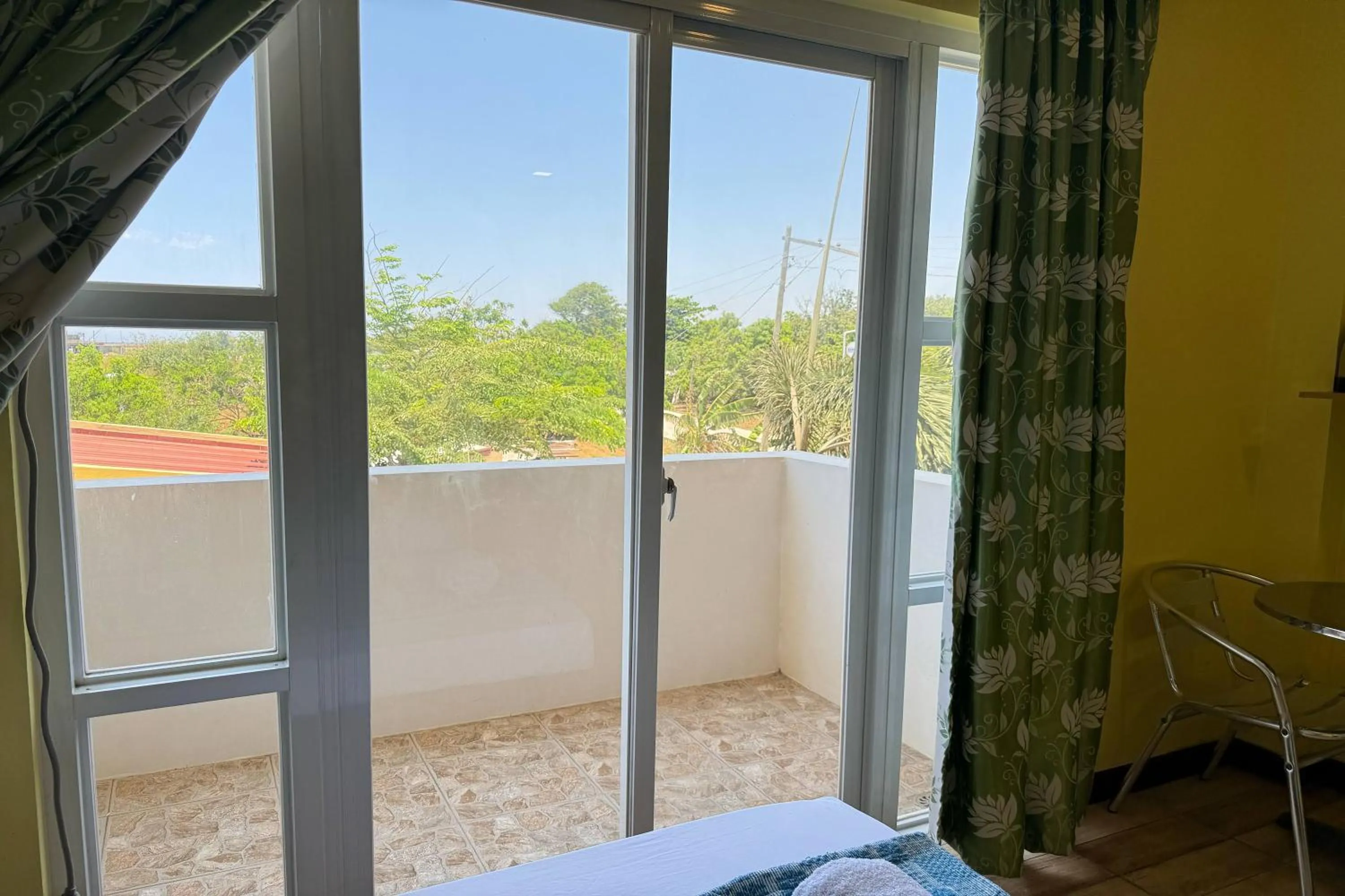 Balcony/Terrace, Bed in OveMar Resort Hotel near Vigan