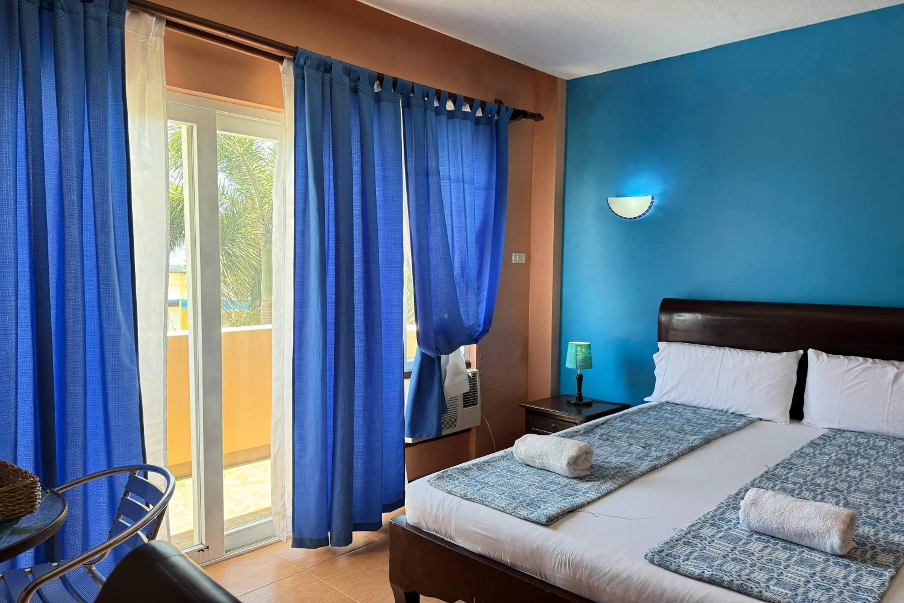 Bed in OveMar Resort Hotel near Vigan