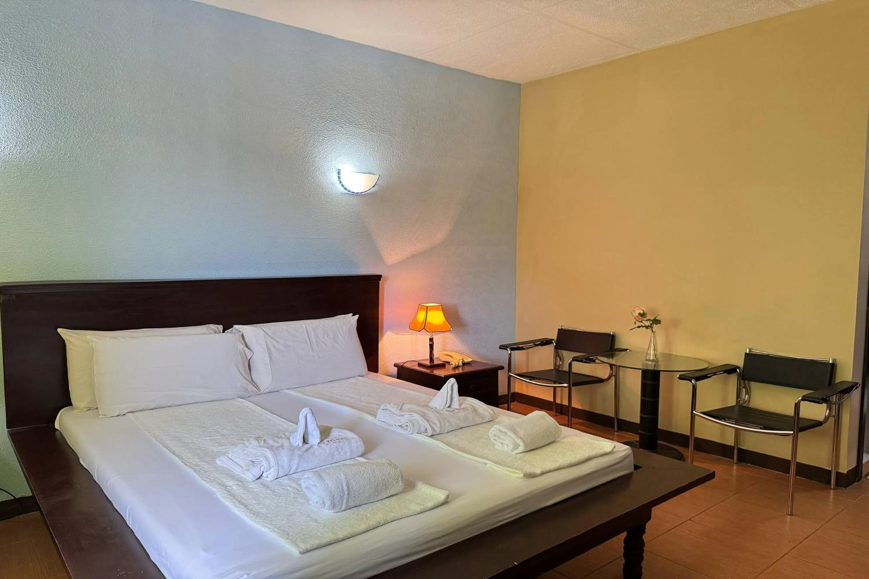 Bed in OveMar Resort Hotel near Vigan