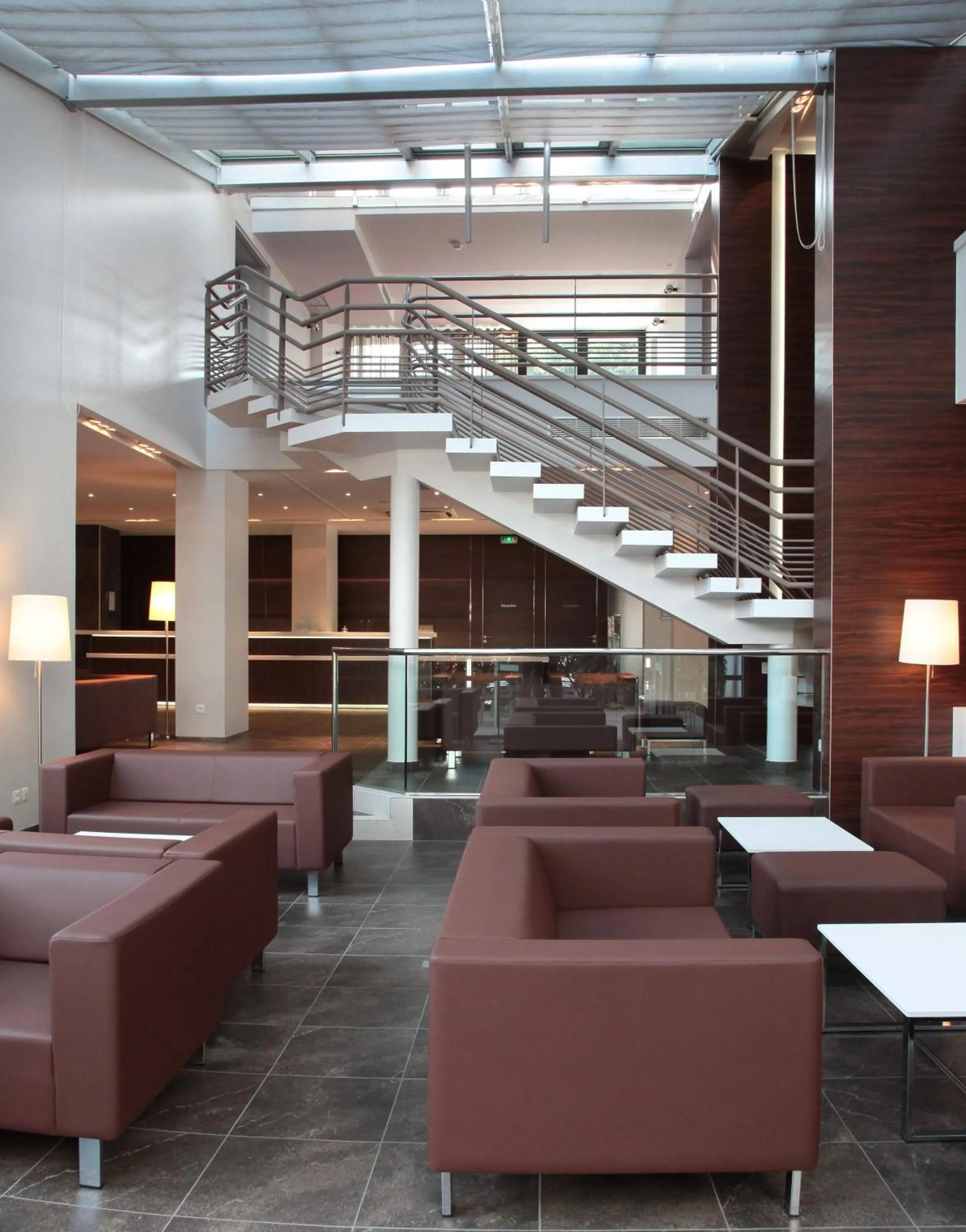 Communal lounge/ TV room in Hôtel Le Méditerranée